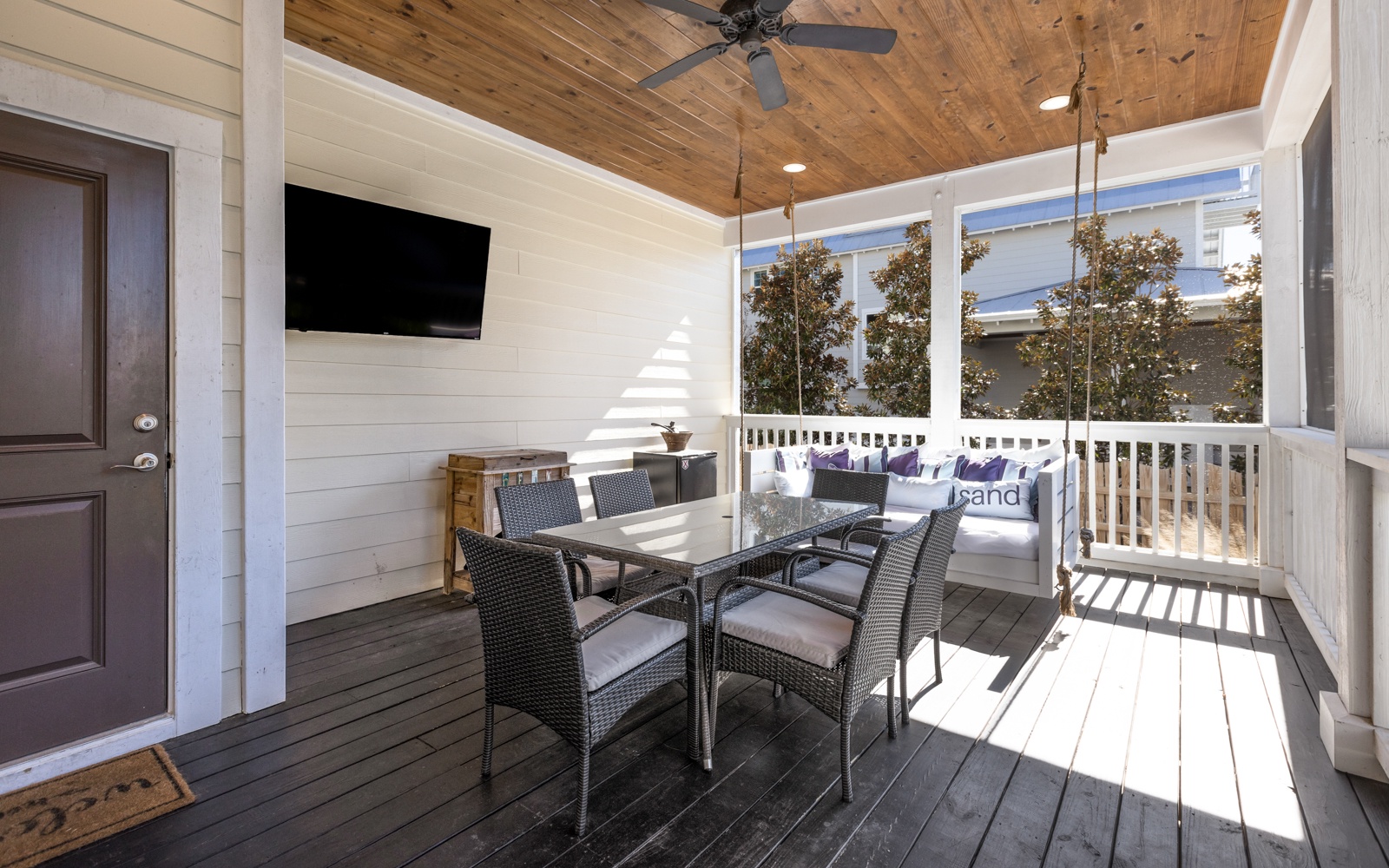 Relax on your private covered porch with dining space, swing seating, and entertainment - perfect for morning coffee or evening wind-down.