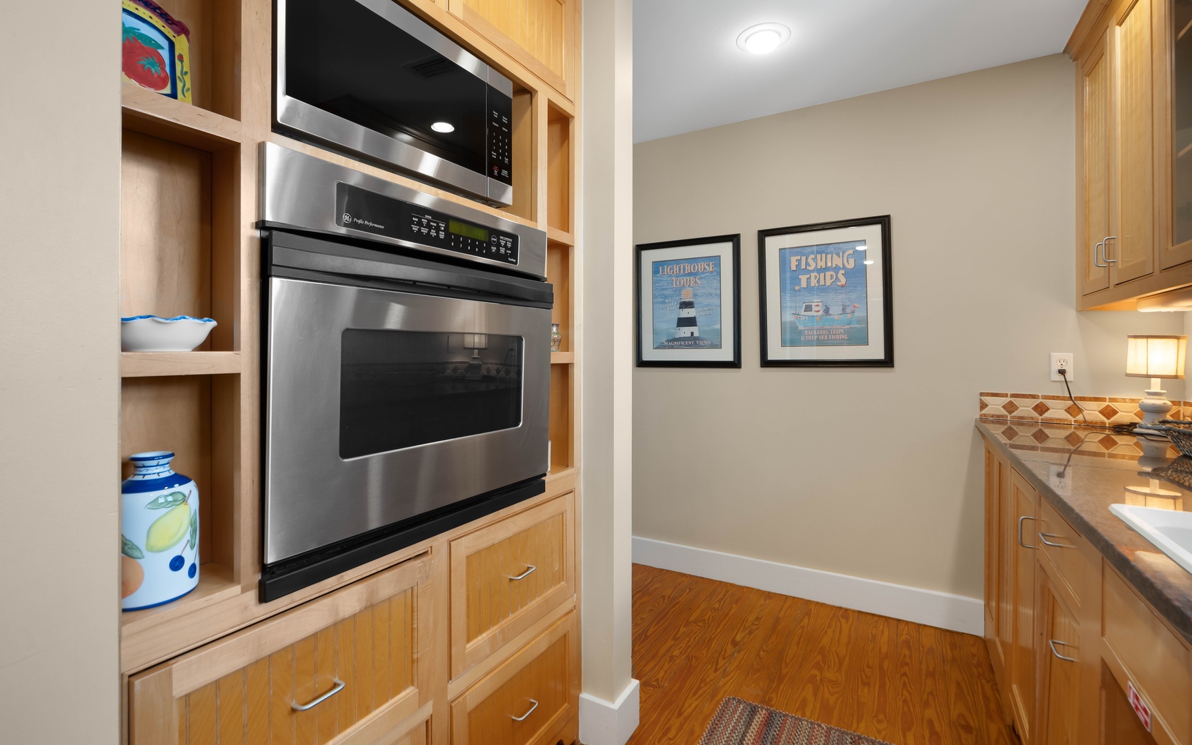 Your modern kitchen features stainless steel appliances and warm wood cabinetry, creating the perfect space for preparing meals during your stay.