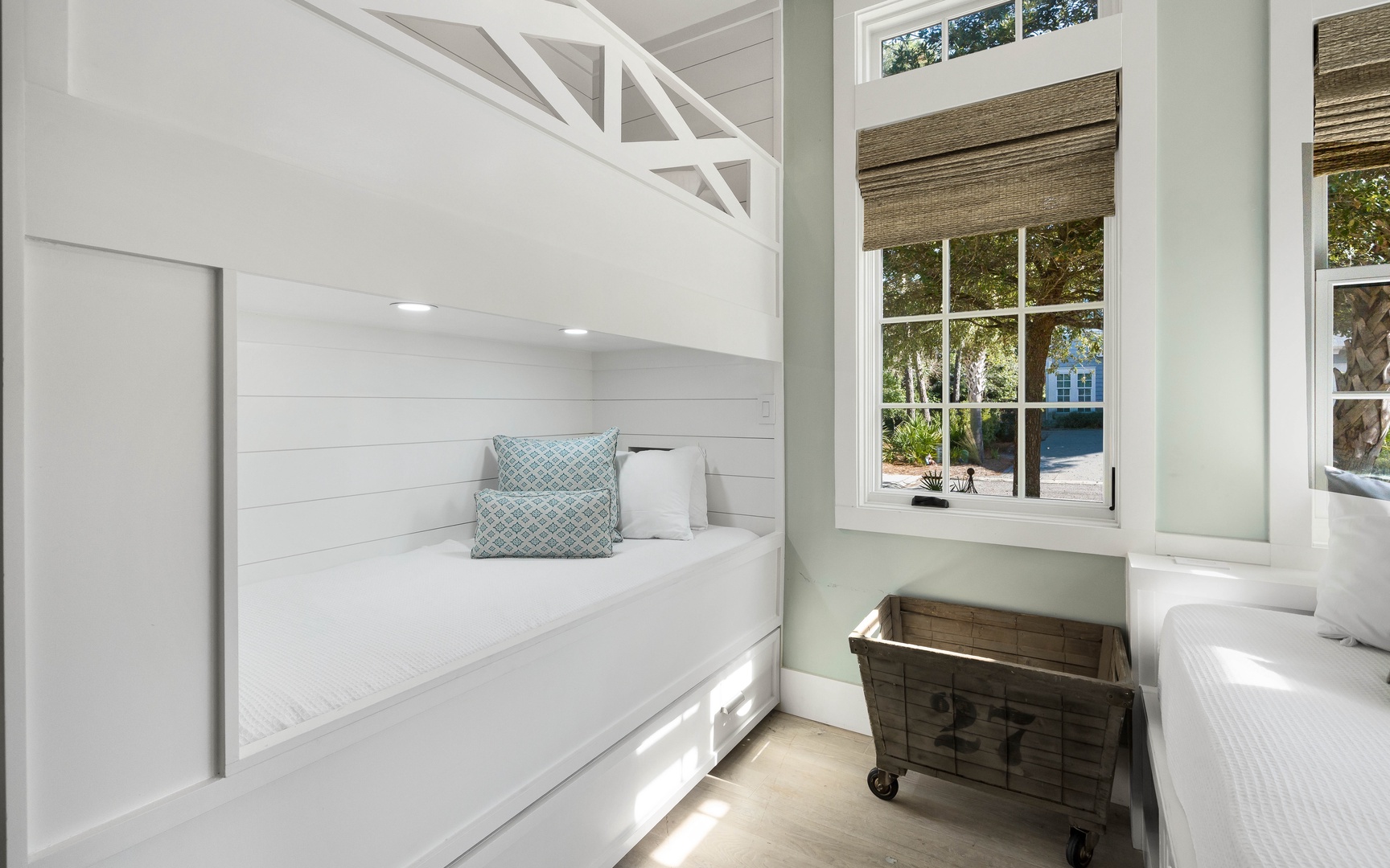 Your cozy bunk room features built-in beds with crisp linens and charming coastal touches, perfect for families or friends sharing adventures.