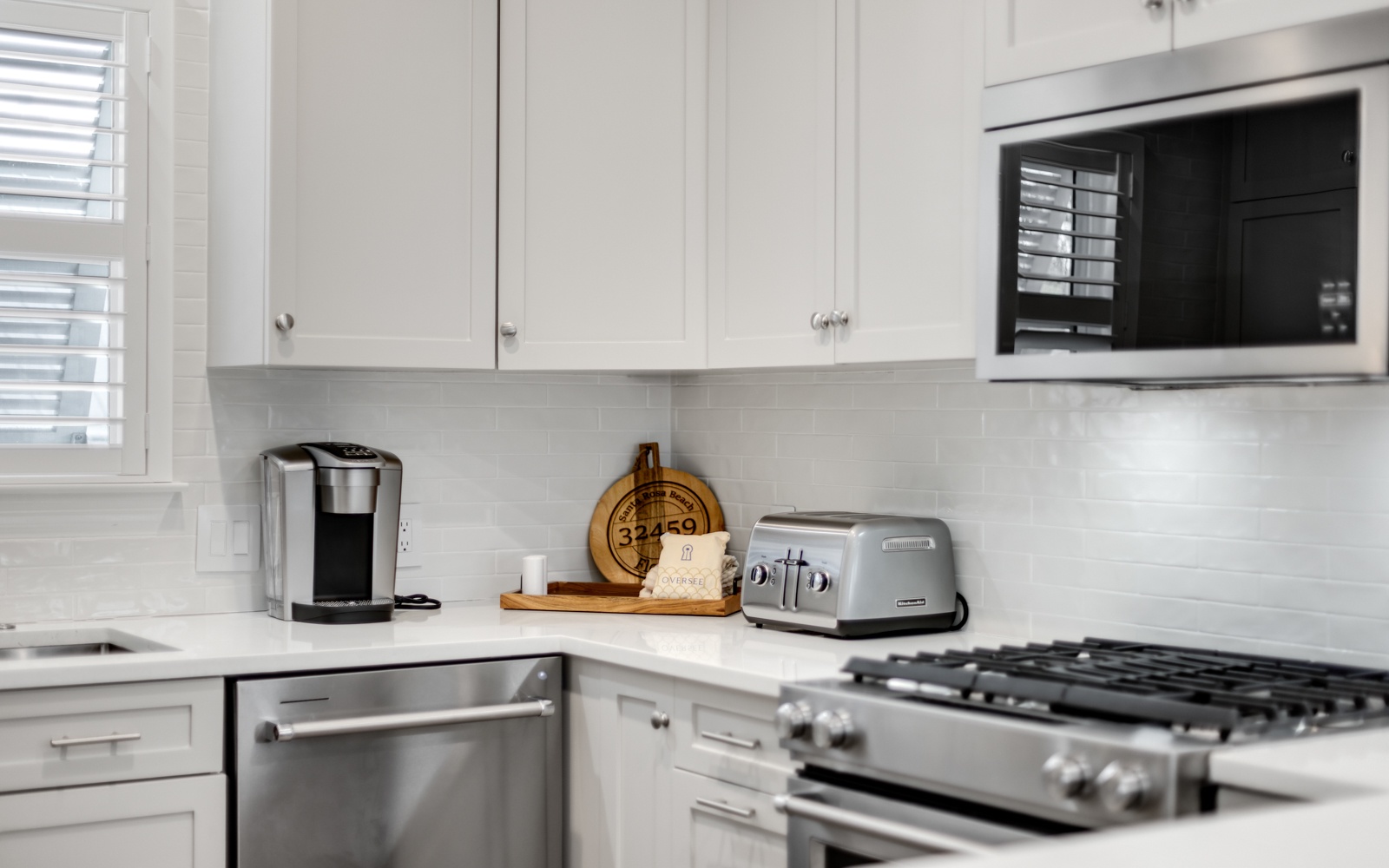 Your bright kitchen comes complete with modern appliances and thoughtful touches, ready for your culinary adventures.