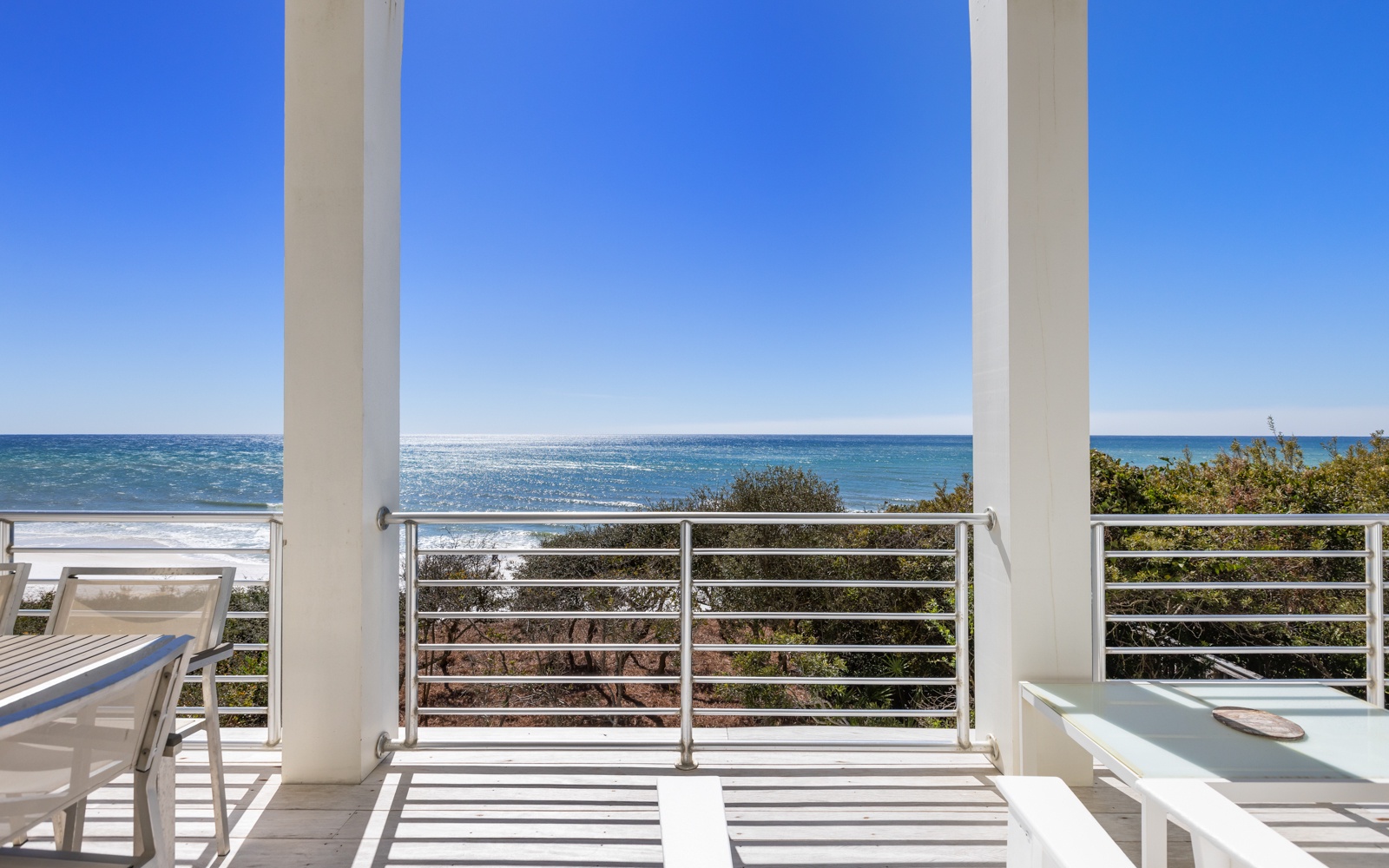 Wake up to your private gulf front balcony where morning coffee becomes a ritual with endless blue horizons and gentle sea breezes.