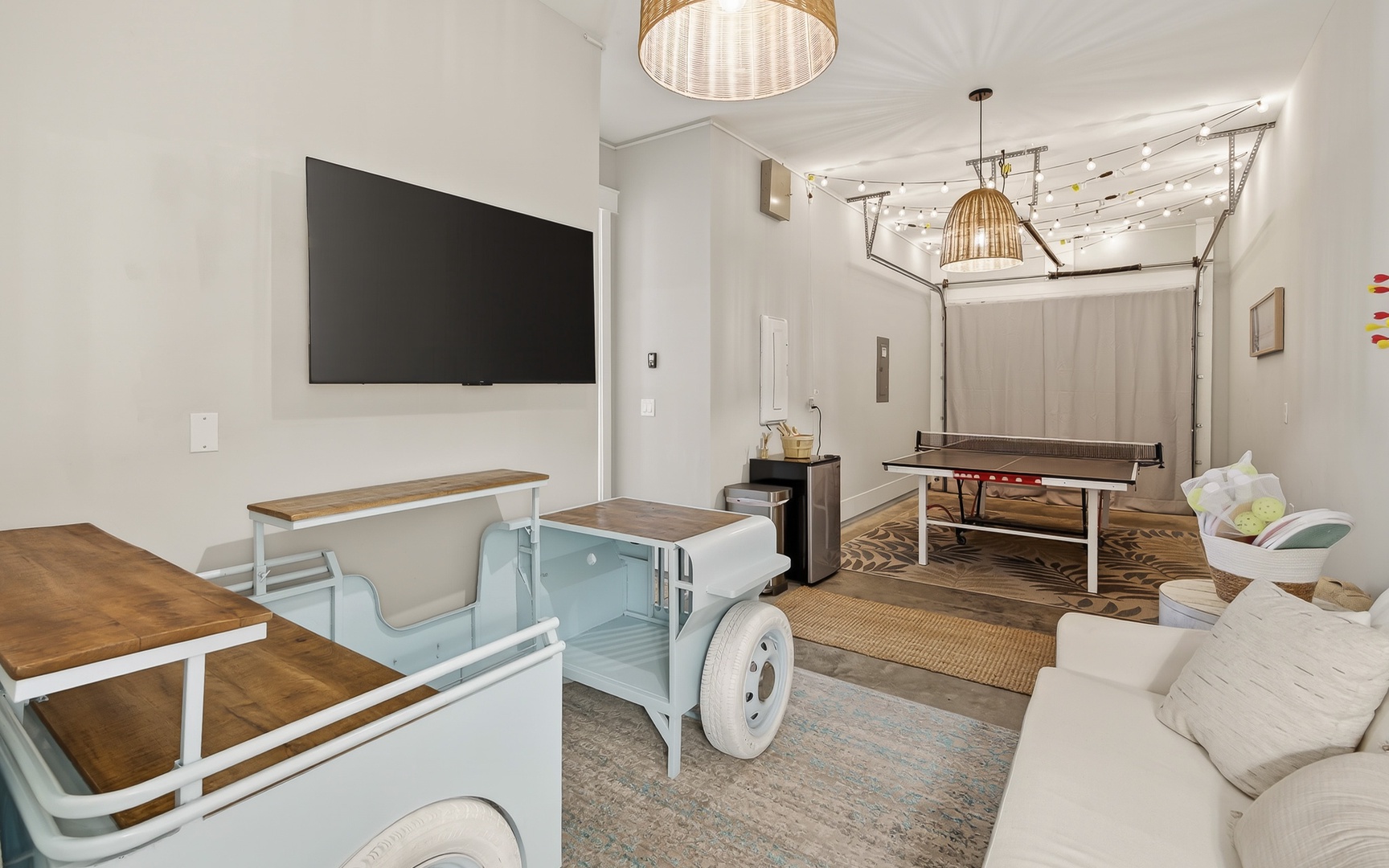 Your ultimate game room awaits with ping pong, cozy seating, and entertainment for memorable evenings with friends and family.