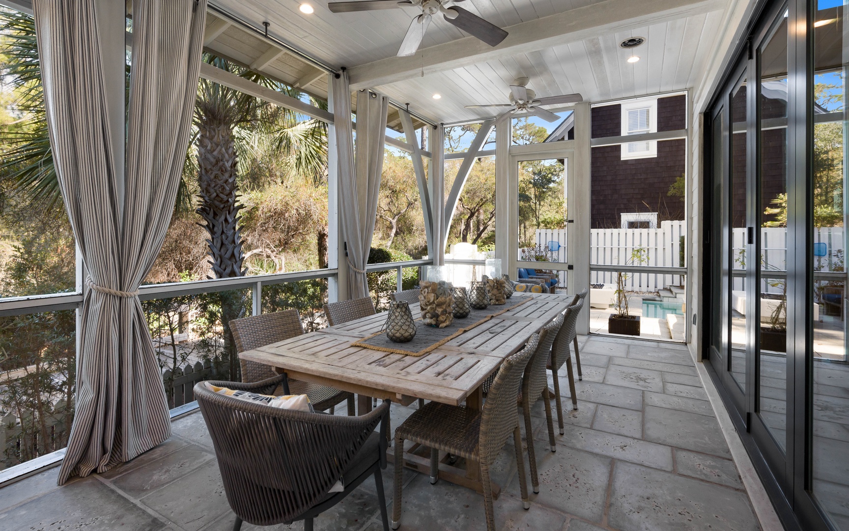 Dine al fresco in your screened porch, where palm breezes flow through and pool views create the perfect backdrop for memorable meals.