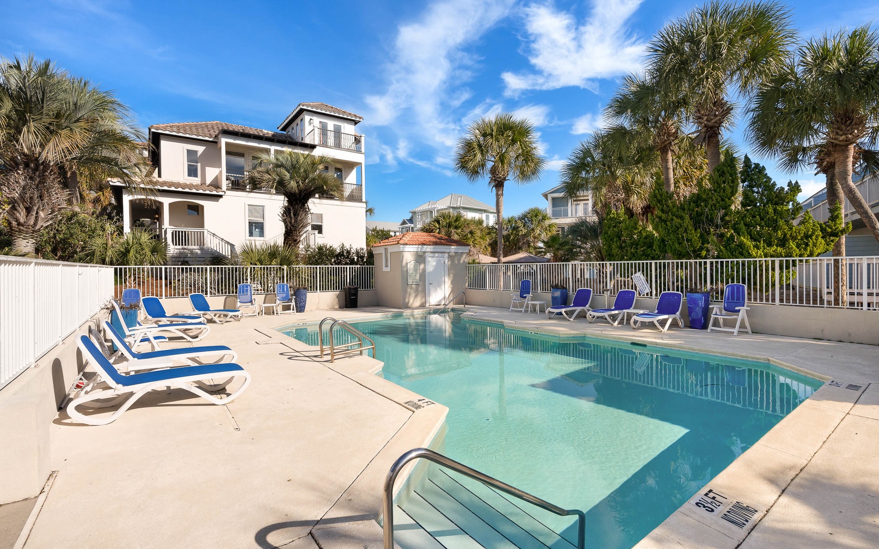Your private oasis awaits with sparkling blue waters surrounded by comfortable lounge chairs, perfect for soaking up the Florida sunshine.
