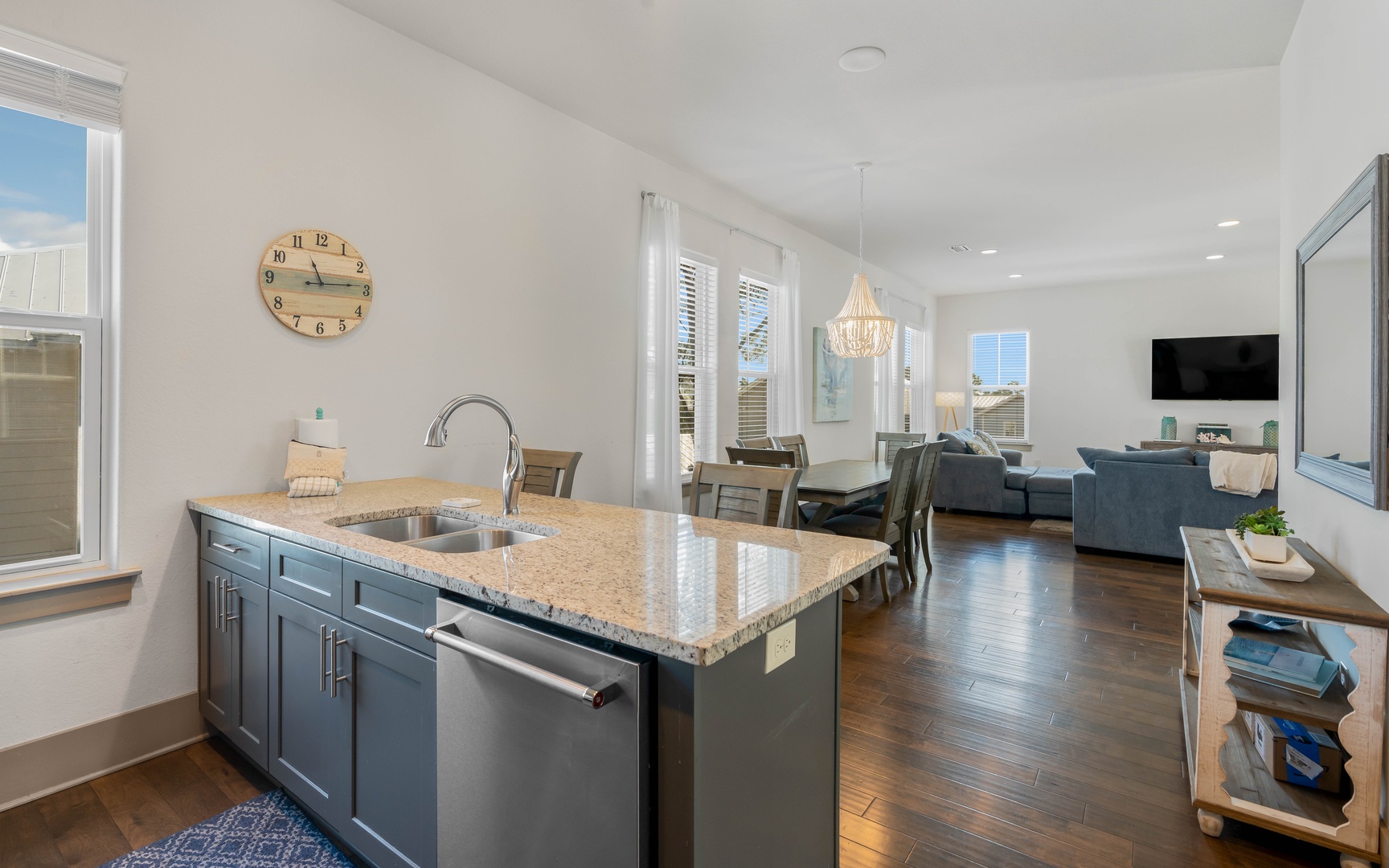 Your modern open-concept kitchen flows seamlessly into the living area, creating the perfect space to cook, dine, and unwind together.