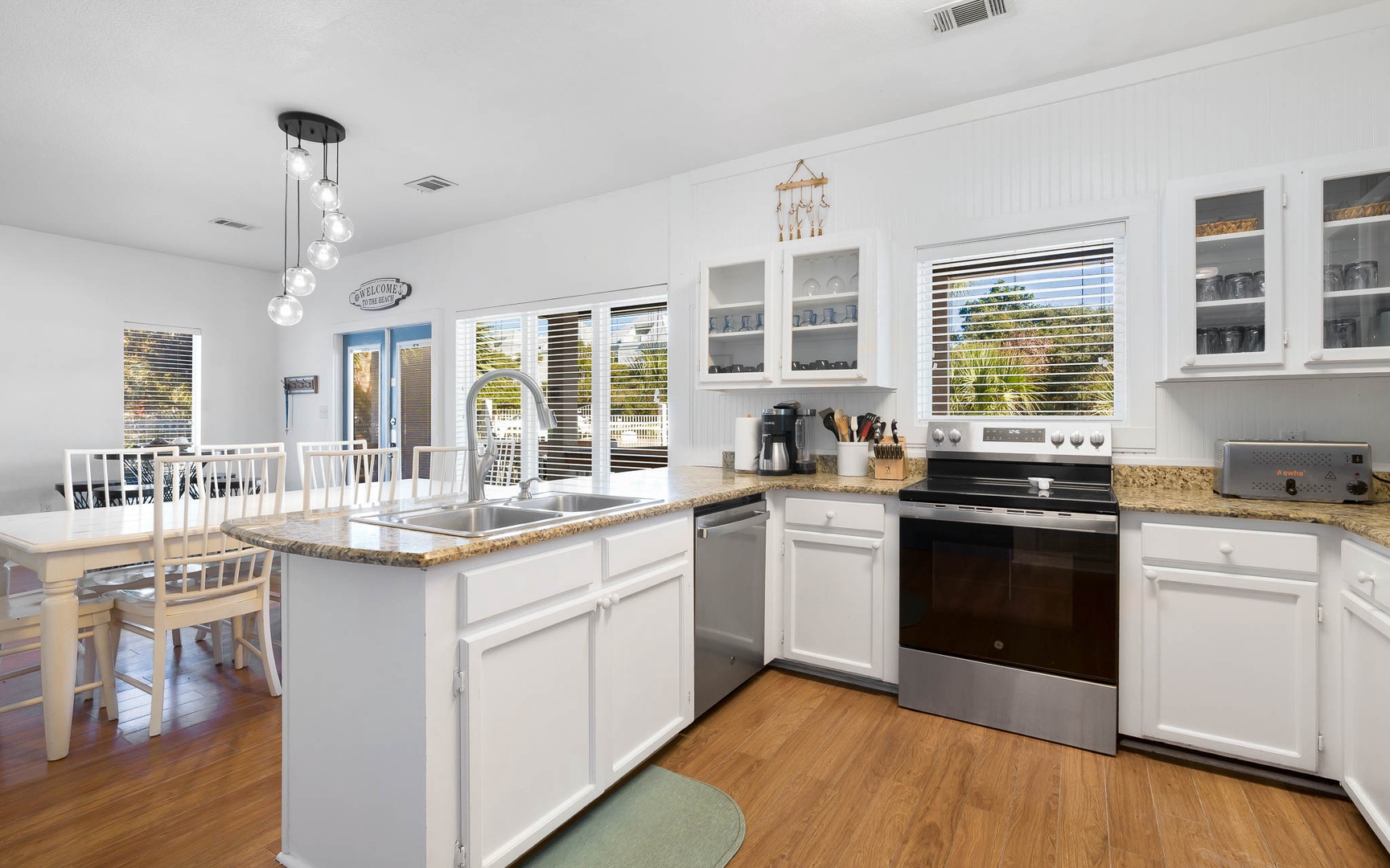 Your bright, open kitchen offers granite countertops, stainless appliances, and a spacious island perfect for preparing meals with family and friends.