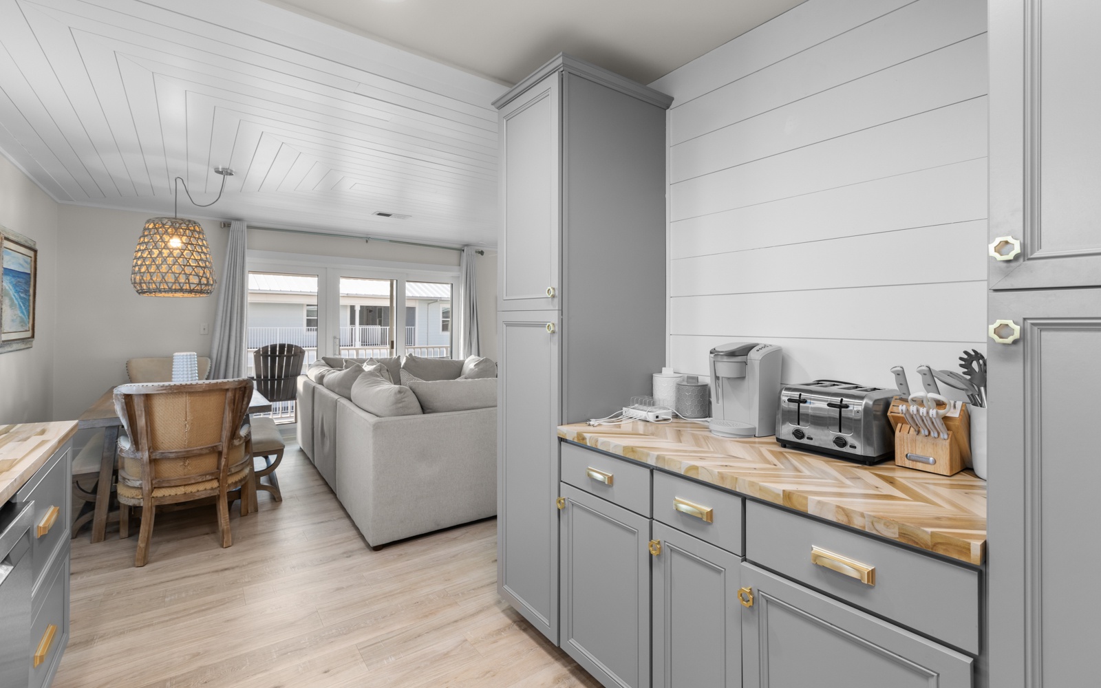 You'll love the seamless flow between your stylish kitchen and cozy living space, perfect for morning coffee or evening conversations.