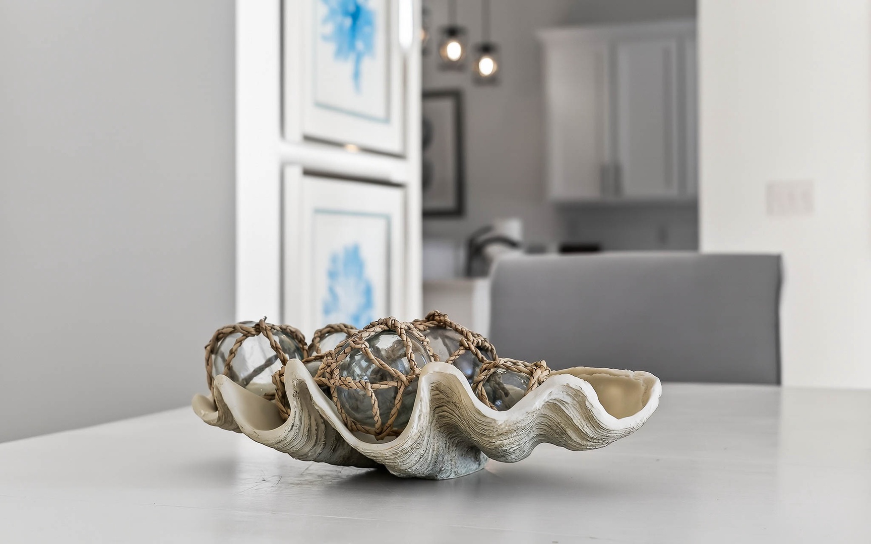 You'll love the elegant touches throughout this bright, modern space with its sleek kitchen and thoughtful coastal-inspired decor.