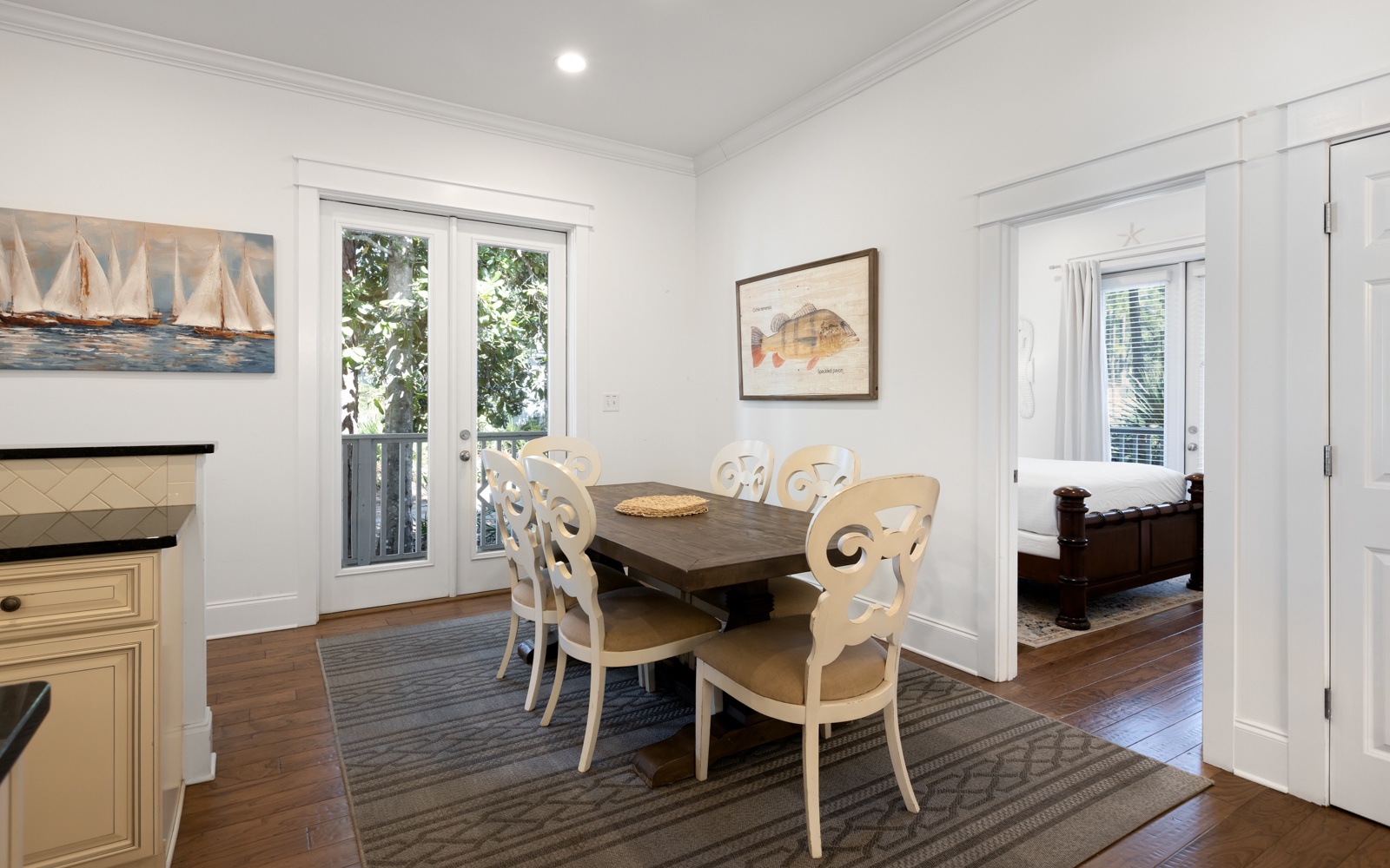 Gather around this elegant dining table where coastal charm meets comfort, perfect for sharing meals and making memories.