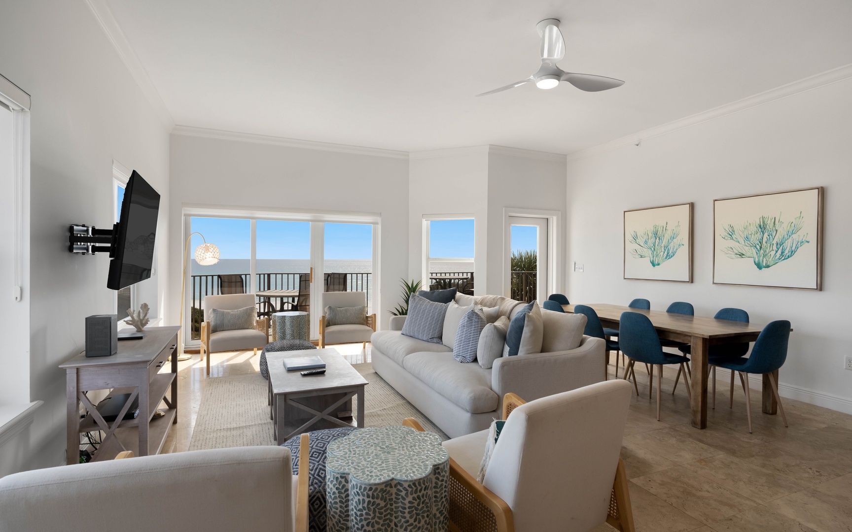 Unwind in your bright, coastal-inspired living space with plush seating and stunning ocean views from your private balcony.
