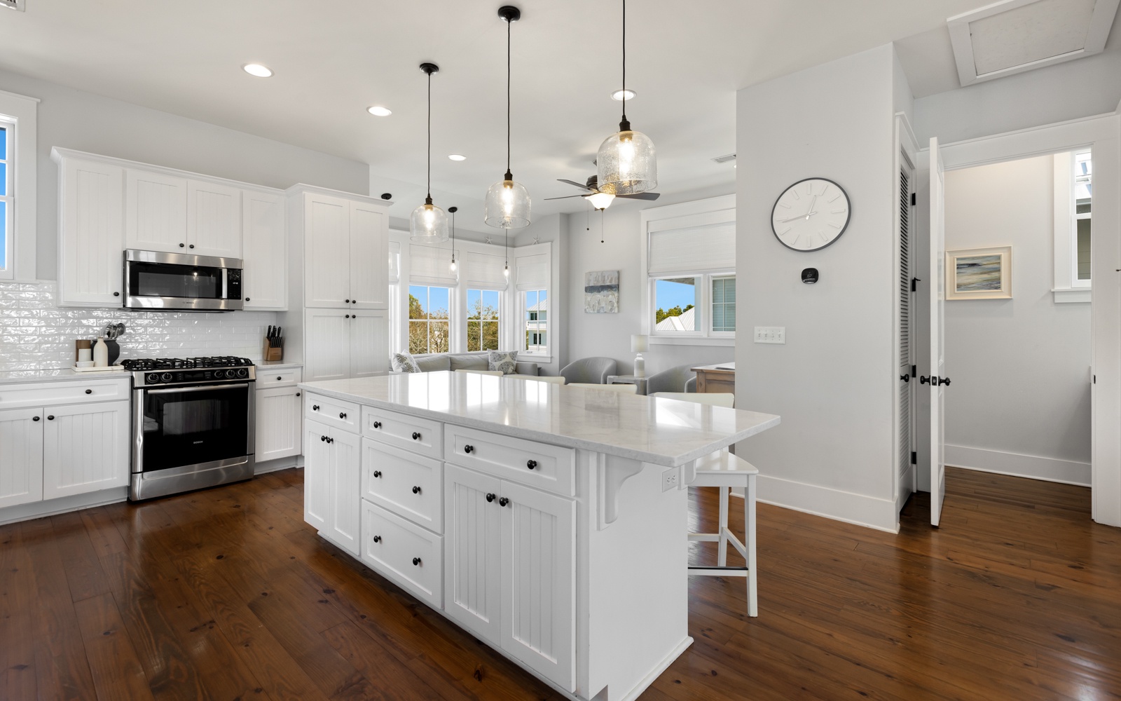 Your bright modern kitchen features gleaming countertops, stylish pendant lighting, and everything you need to create memorable meals together.
