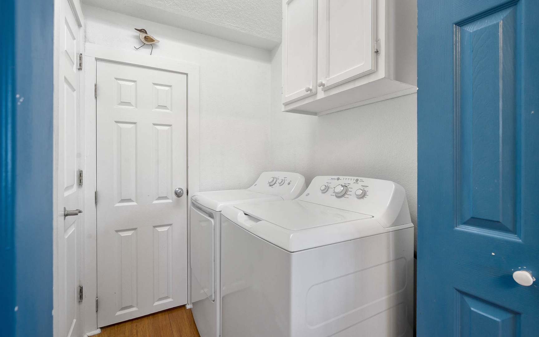 Your dedicated laundry room features full-size washer and dryer with convenient overhead storage for all your vacation essentials.