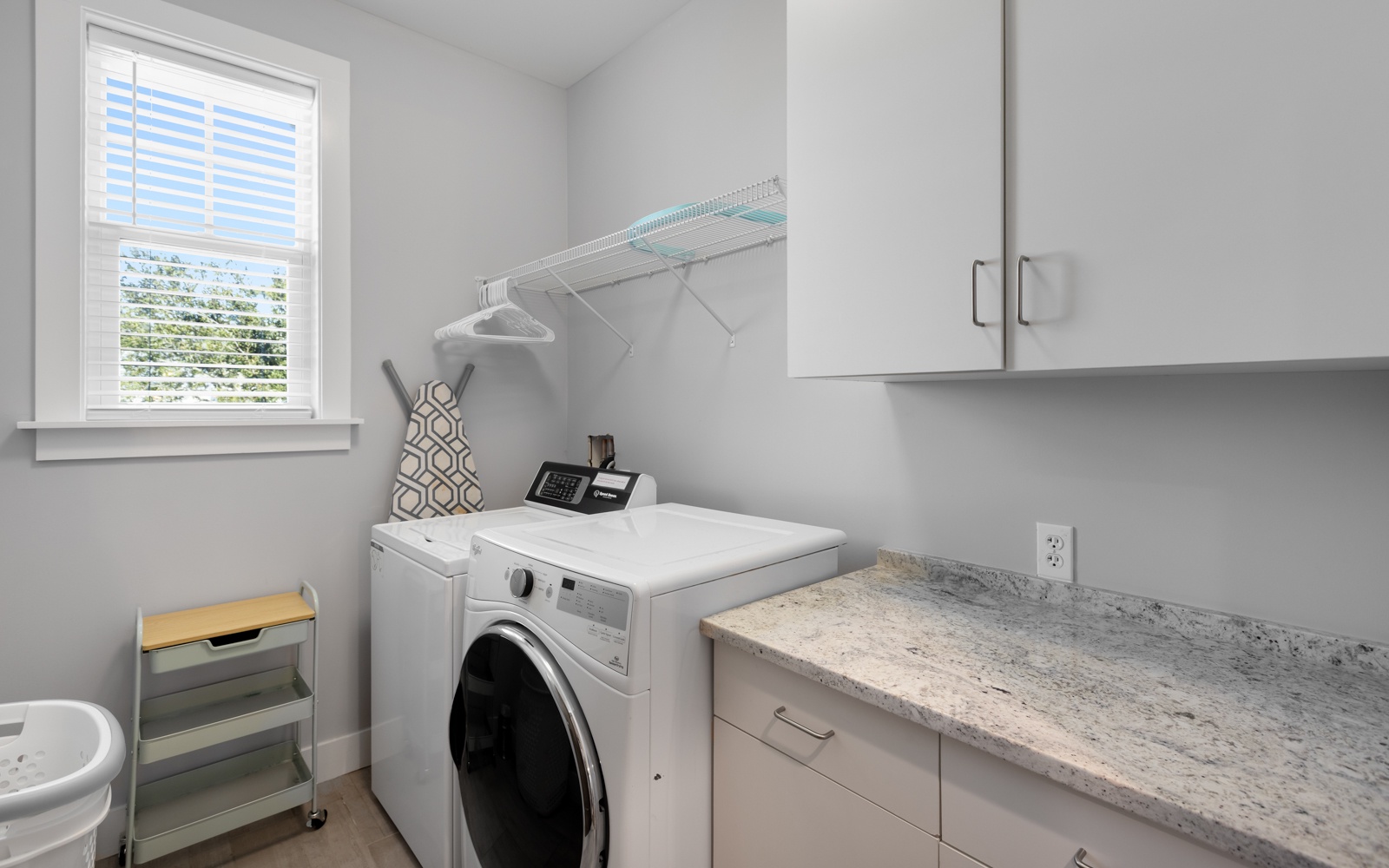 Your private laundry room makes staying organized effortless with modern appliances and ample storage space.
