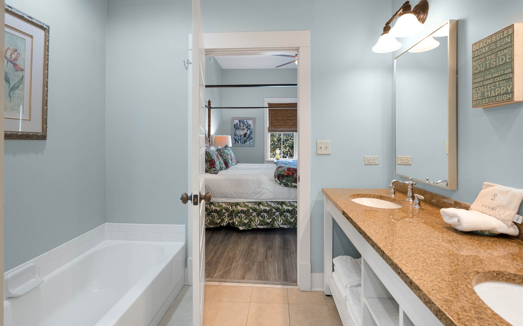 Your spacious bathroom features a soaking tub, granite vanity, and connects seamlessly to your bedroom retreat.