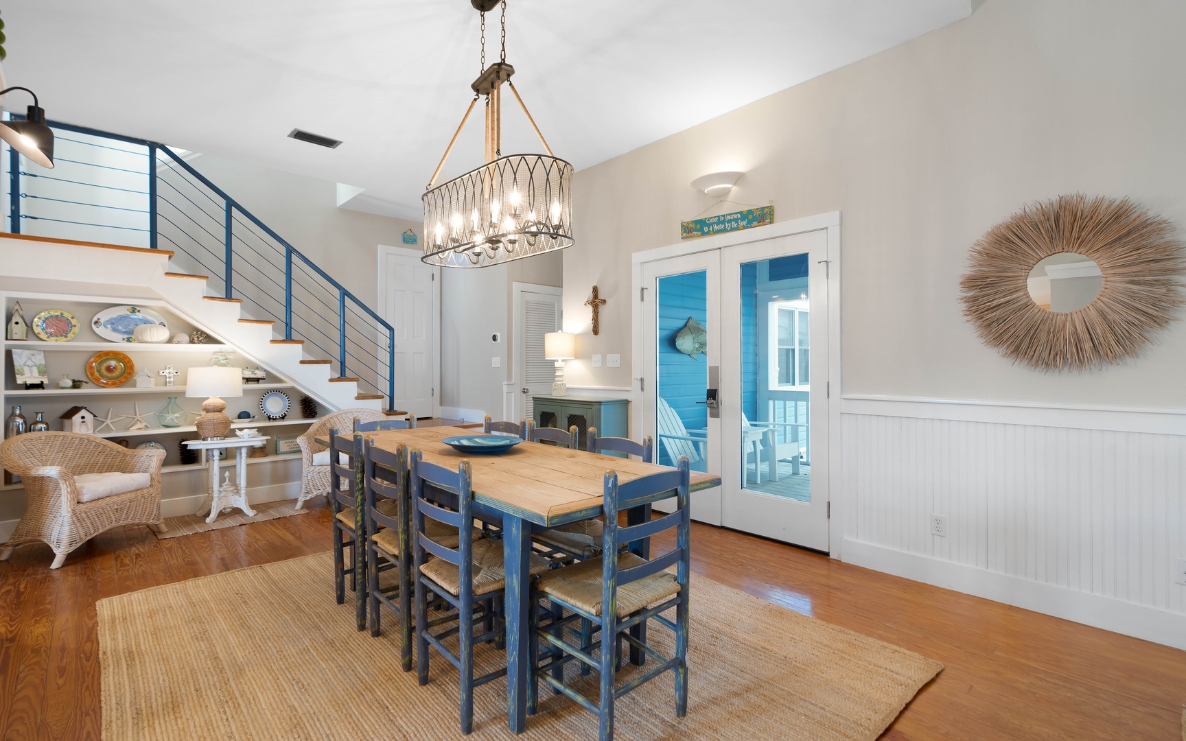 Gather around your beautiful dining table in this bright coastal-inspired space, where sea breezes flow through French doors onto your private balcony.