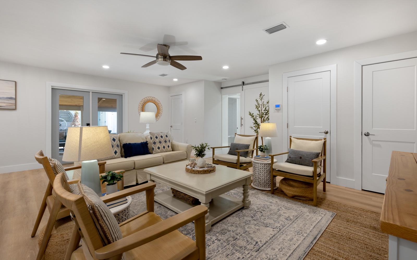 Relax in your thoughtfully designed living room with comfortable seating, warm wood accents, and modern touches that create the perfect atmosphere for unwinding.