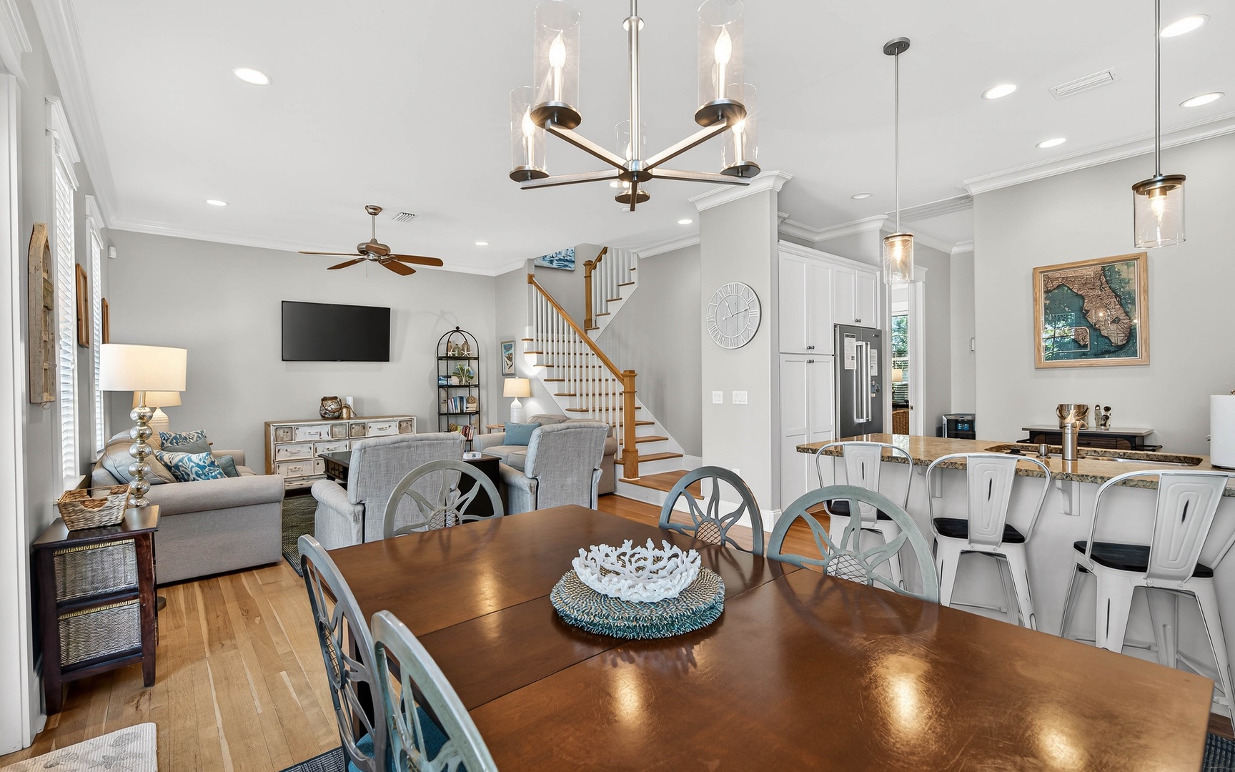 Relax in your open-concept haven where modern elegance meets coastal charm—perfect for gathering with loved ones.