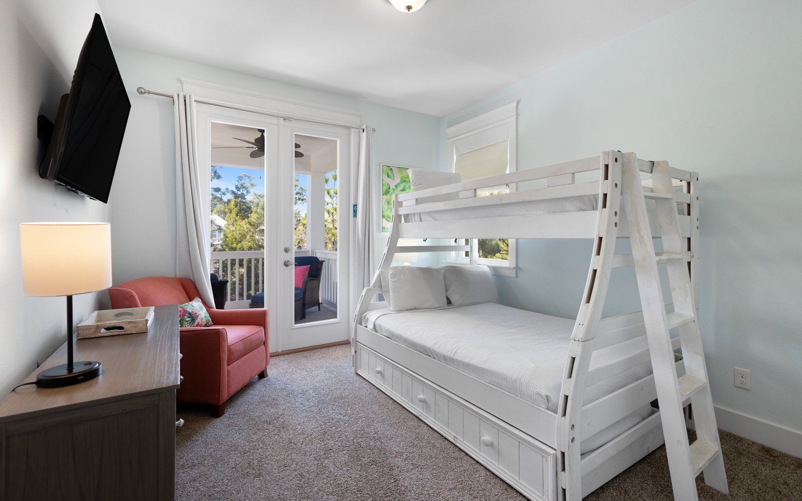 Your kids will love this cozy bedroom with sturdy white bunk beds and their own TV for movie nights.