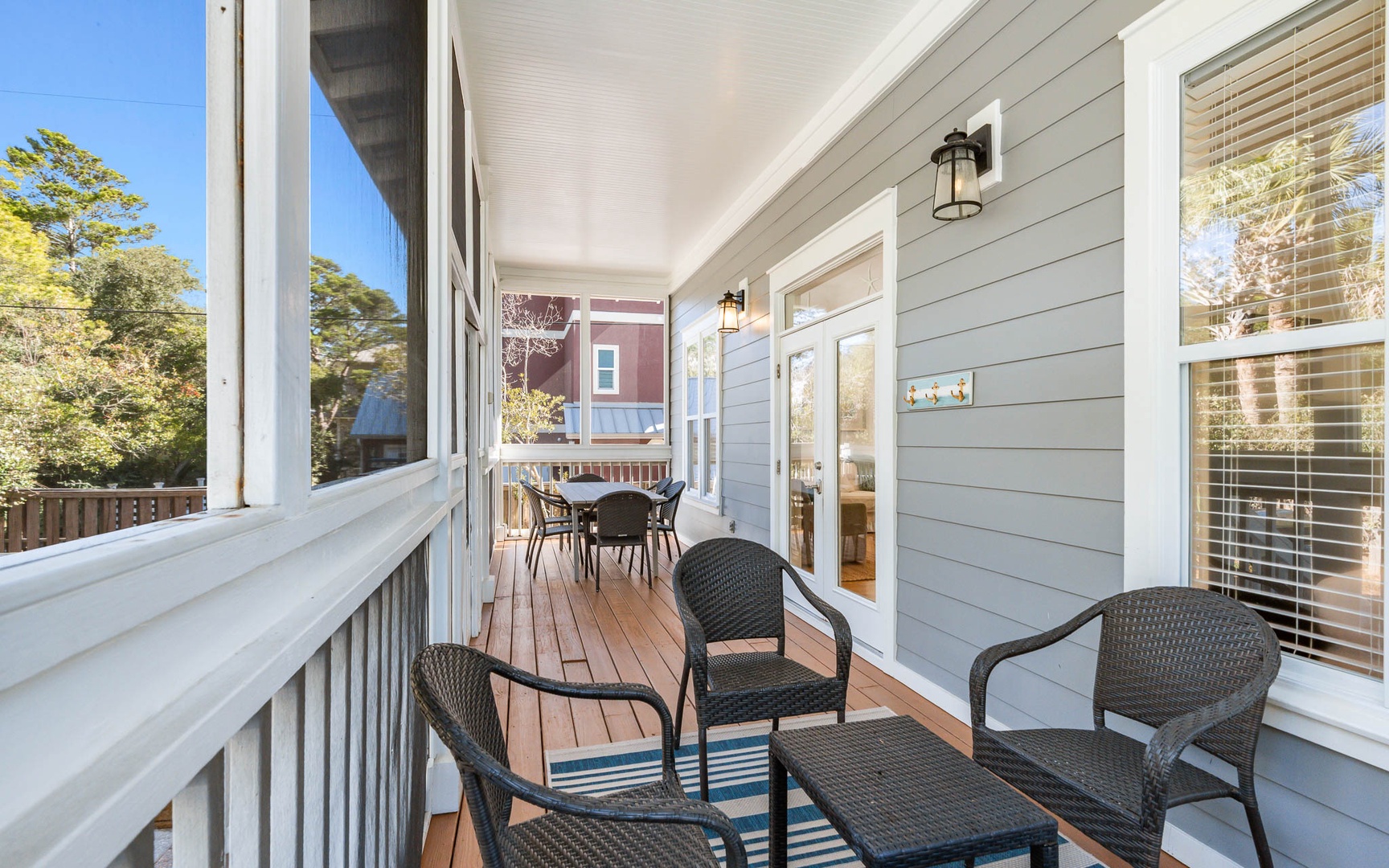 Your private porch offers cozy seating where you can sip morning coffee while watching the neighborhood come alive.