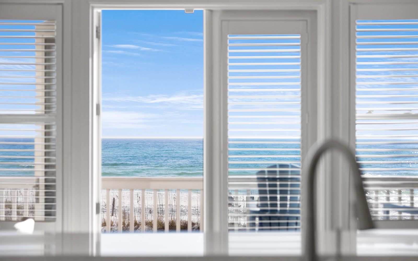 Wake up to breathtaking ocean views through your private balcony doors. The endless blue horizon awaits just steps from your bed.