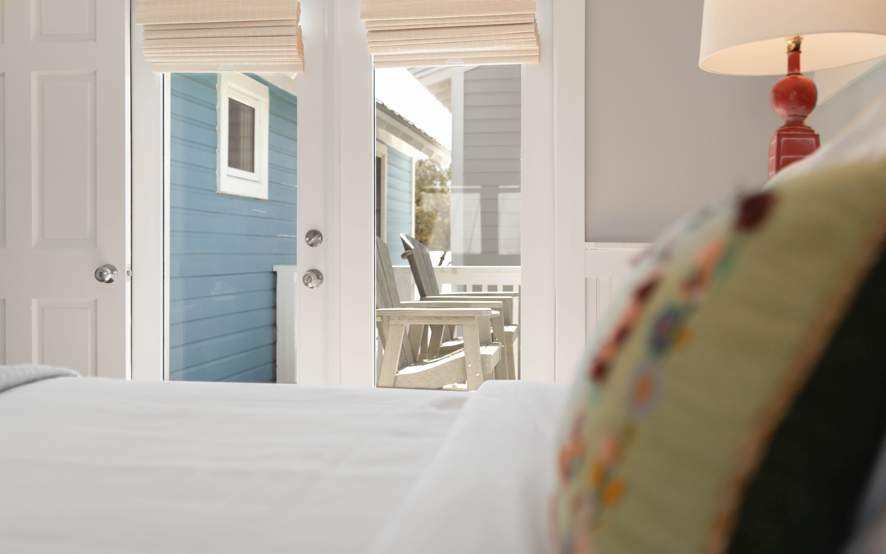 Wake up to peaceful mornings in your cozy bedroom, where soft linens and charming coastal views create the perfect seaside retreat.