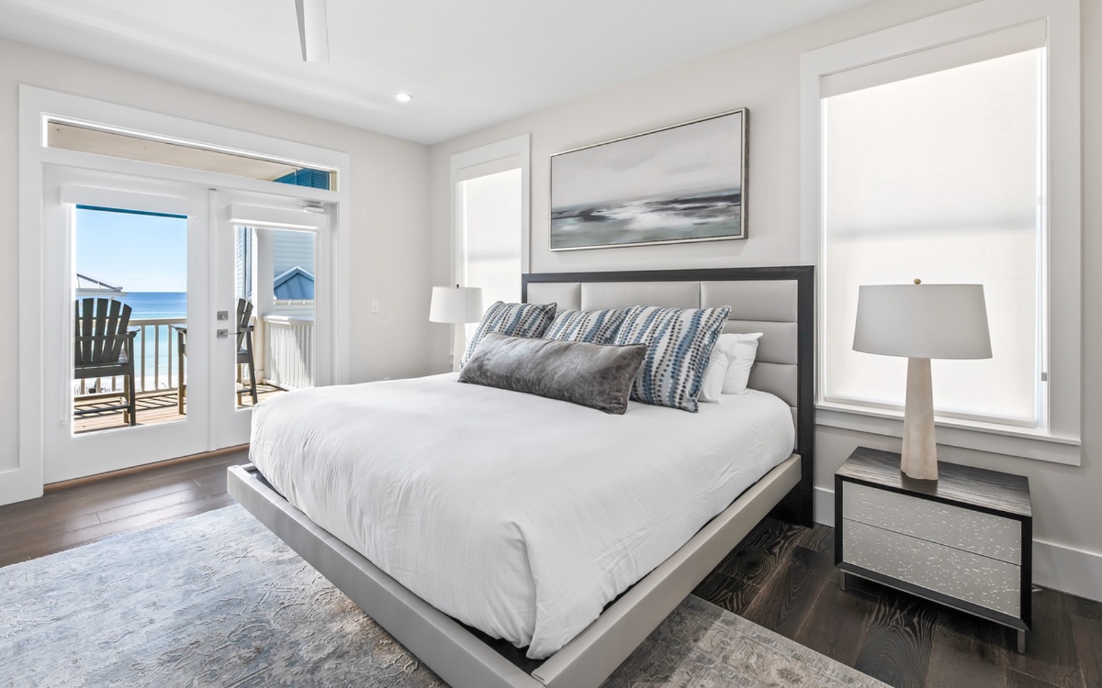 Wake to ocean views from your serene bedroom, where crisp linens and coastal décor create the perfect seaside retreat.