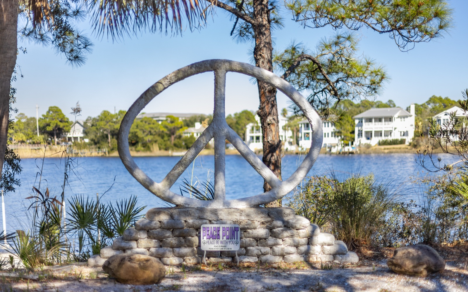 Peace Point monument overlooks tranquil waterfront homes in this scenic neighborhood setting.