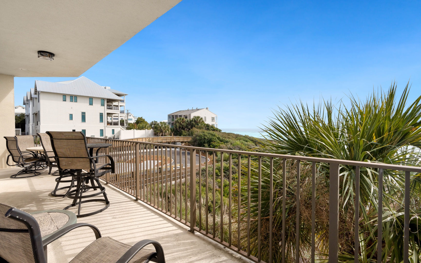 Your private balcony invites you to unwind with morning coffee while enjoying coastal views and tropical breezes.