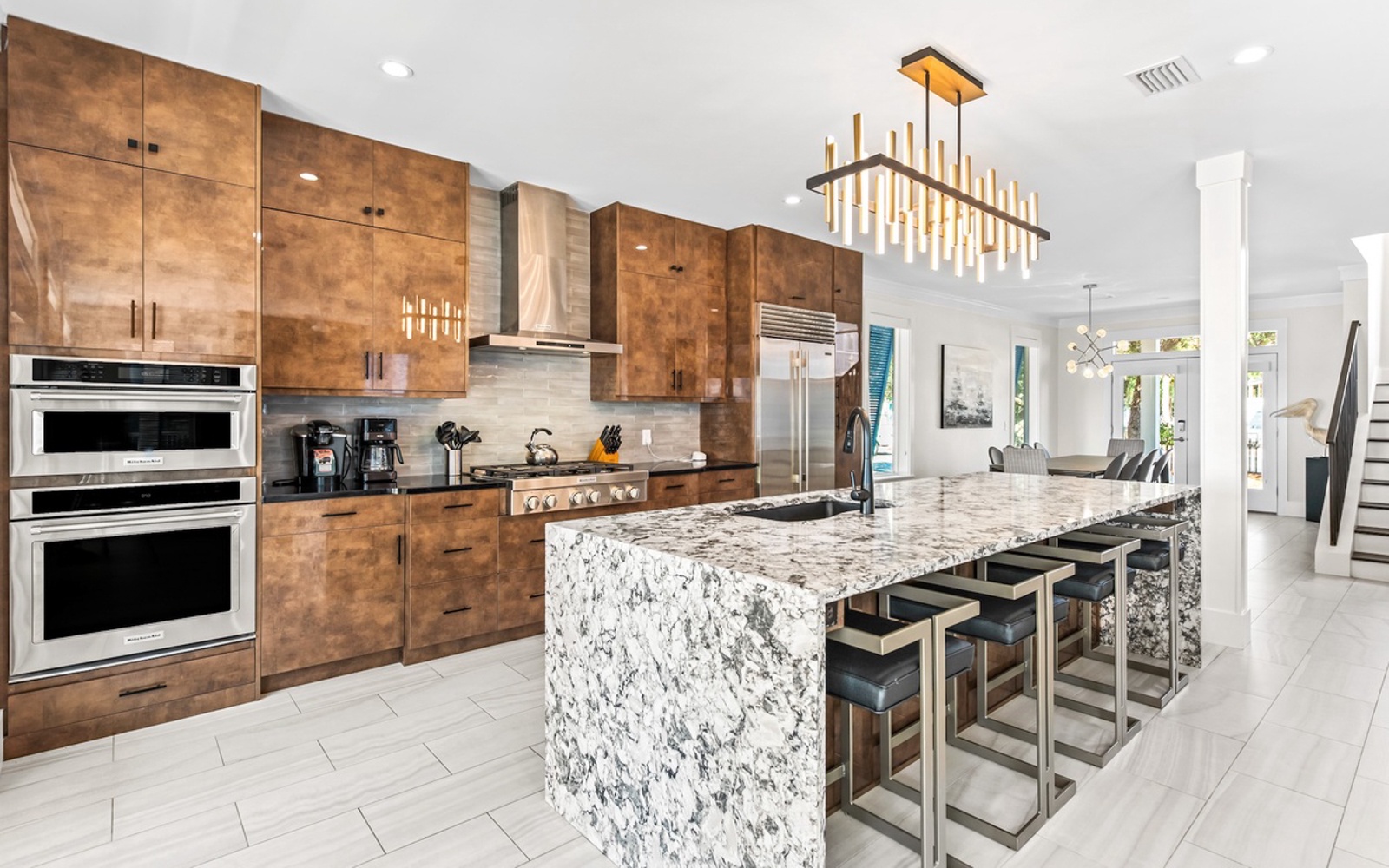 Your gourmet kitchen awaits with sleek marble counters, premium appliances, and stylish pendant lighting for memorable culinary adventures.