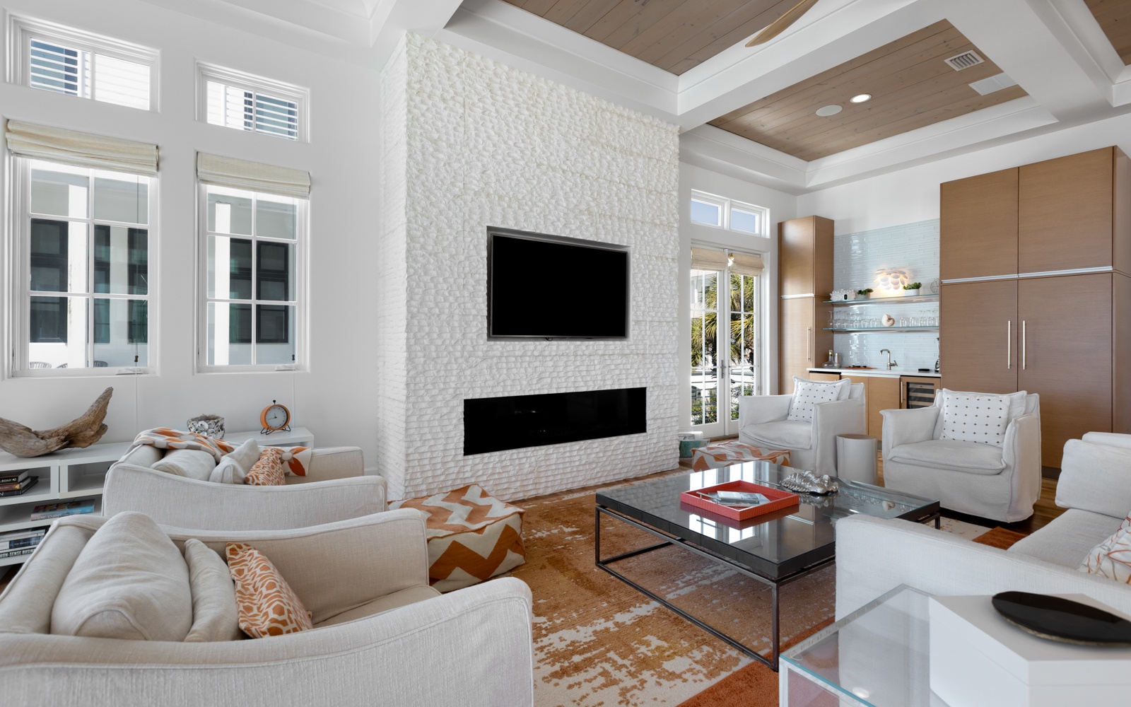 Sink into plush seating while your modern fireplace creates warmth and your open kitchen invites effortless entertaining.