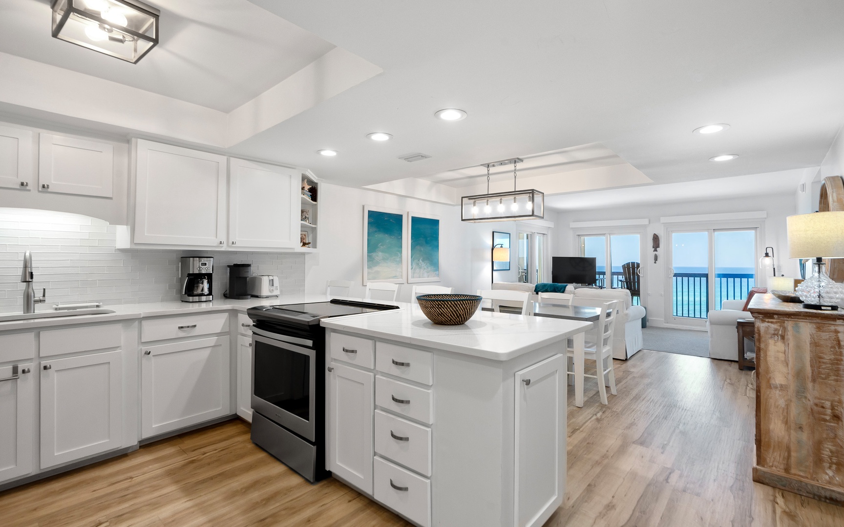 Your spacious kitchen flows seamlessly into the living area, where you'll love cooking with ocean views through the large windows.