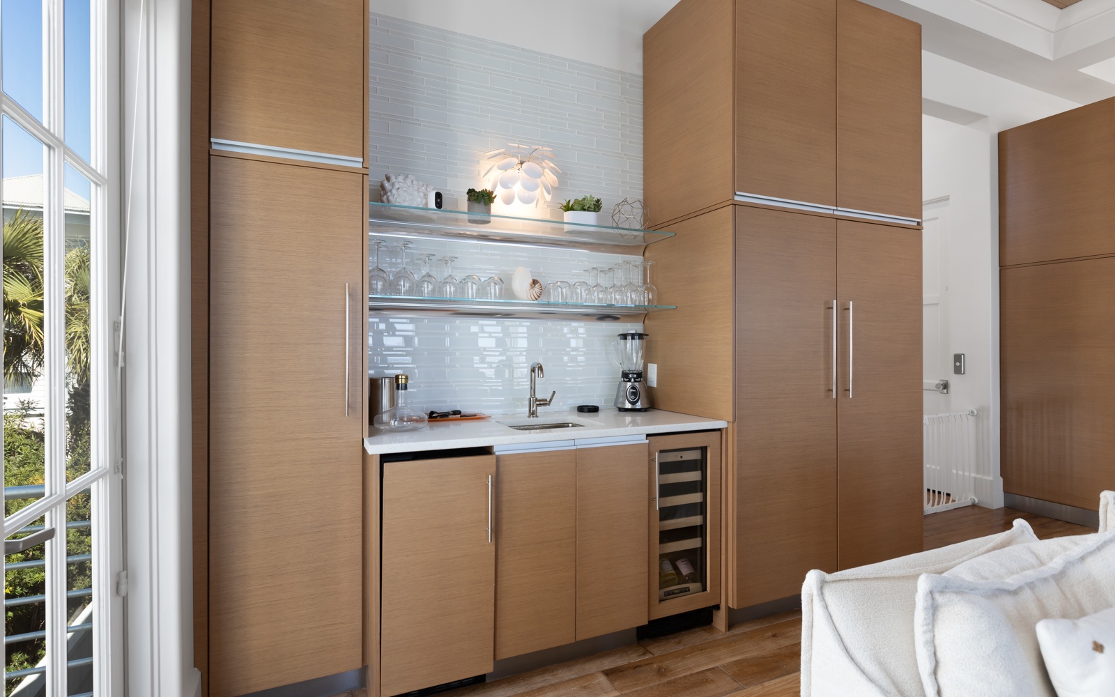 Your stylish kitchenette features sleek wood cabinetry, modern appliances, and gleaming countertops, perfect for preparing morning coffee or evening snacks.