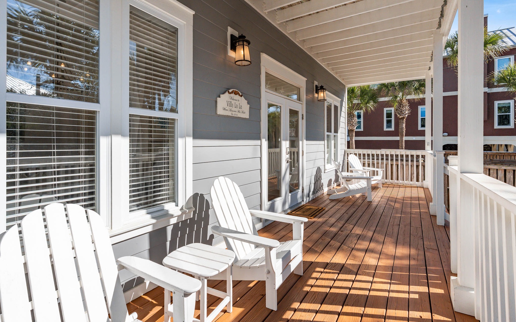 Relax on your private covered porch with comfortable Adirondack chairs and warm wood decking—perfect for morning coffee or evening conversations.