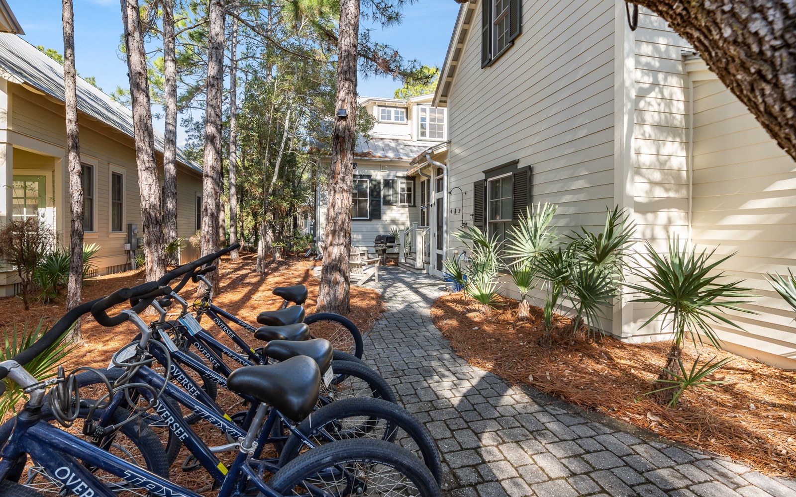 Grab your complimentary bikes and explore the coastal charm! These cruisers await your next adventure through tree-lined paths.