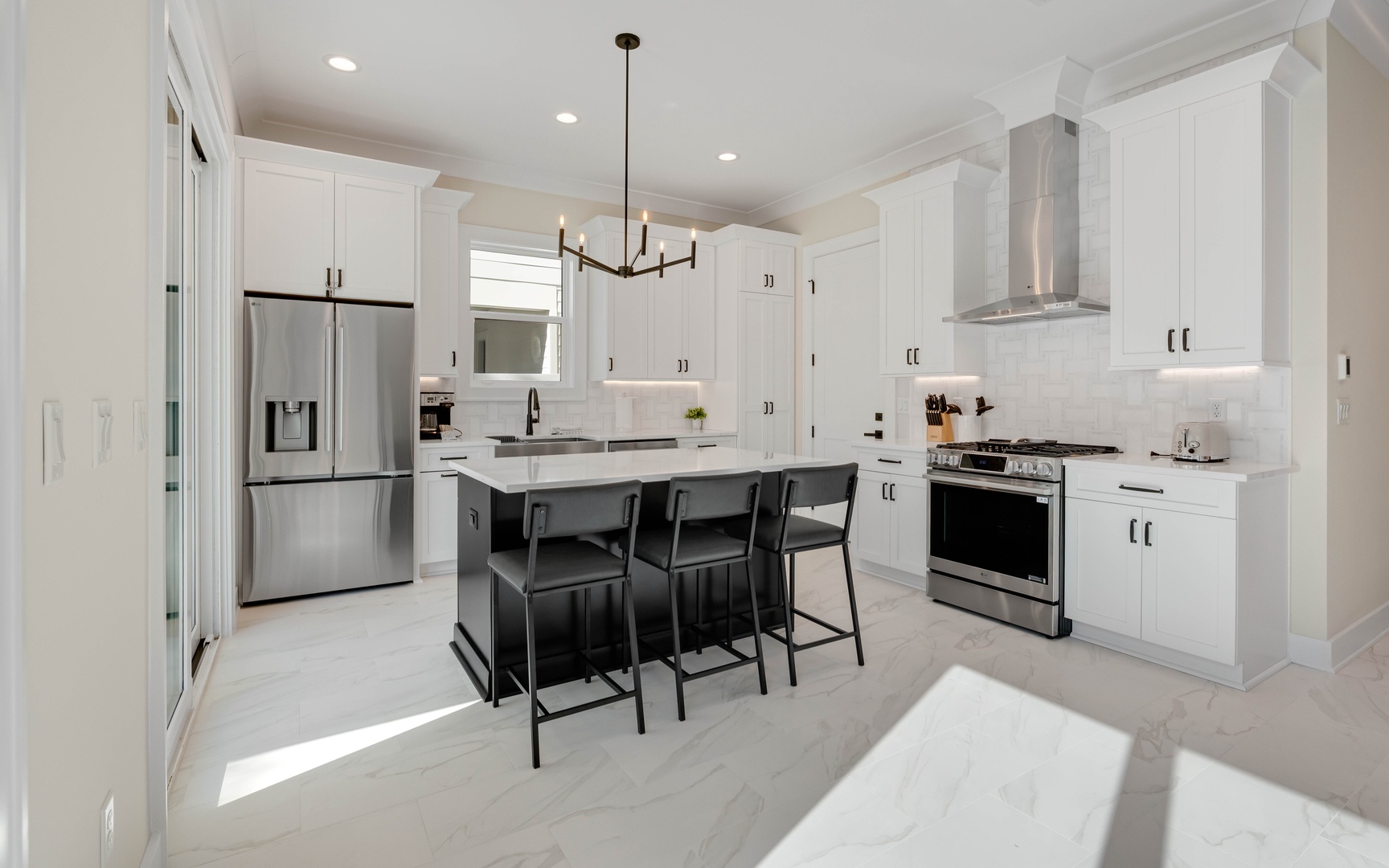 Step into your gourmet kitchen where crisp white cabinets and sleek countertops create the perfect space for culinary adventures and morning coffee moments.