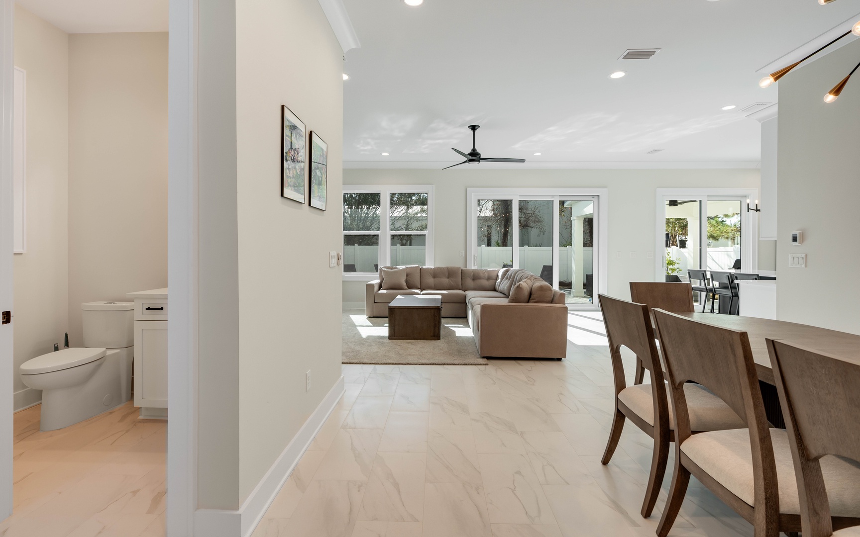 Relax in this bright, open living space where modern comfort meets seamless flow from your cozy seating area to dining space.