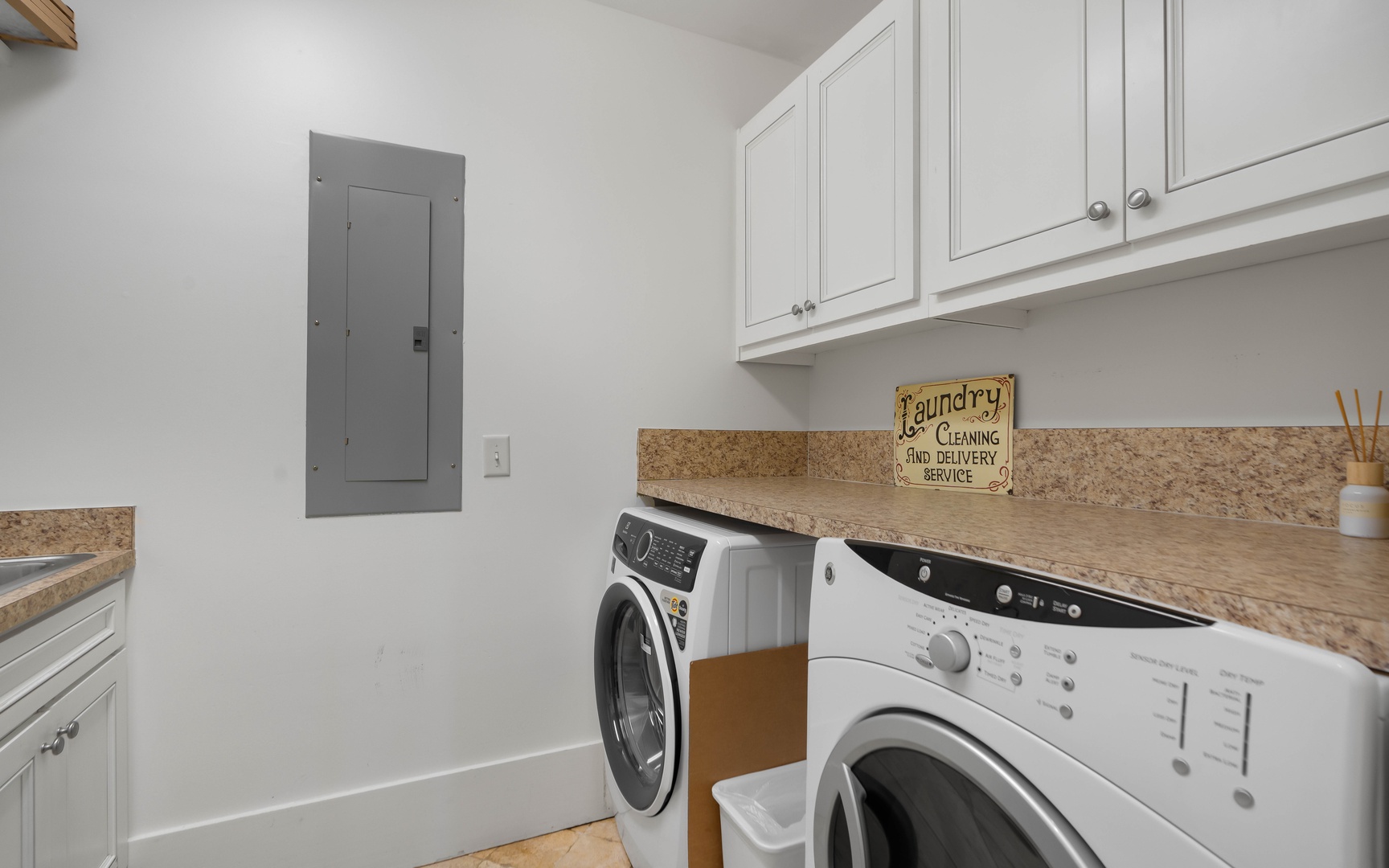 Your dedicated laundry room features full-size washer and dryer with granite countertops for easy folding.