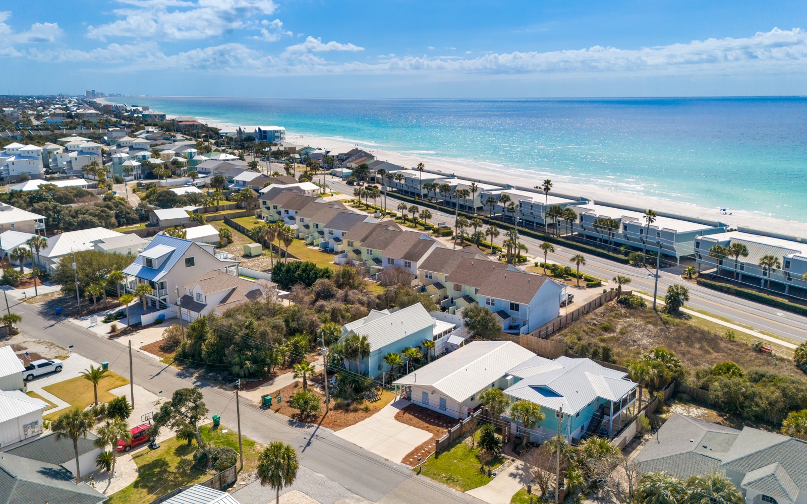 Stunning beachfront location just steps from pristine white sand and crystal-clear turquoise waters.