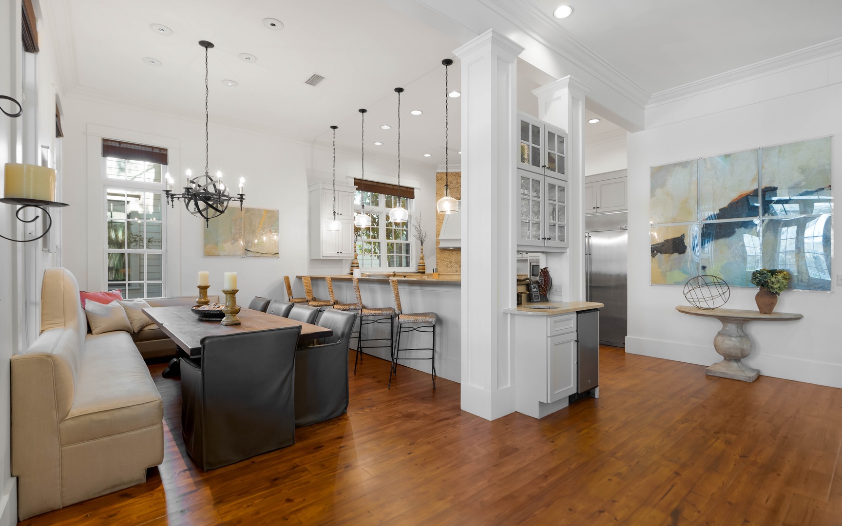 Your open-concept living space flows seamlessly from cozy dining nook to gourmet kitchen, perfect for memorable meals together.