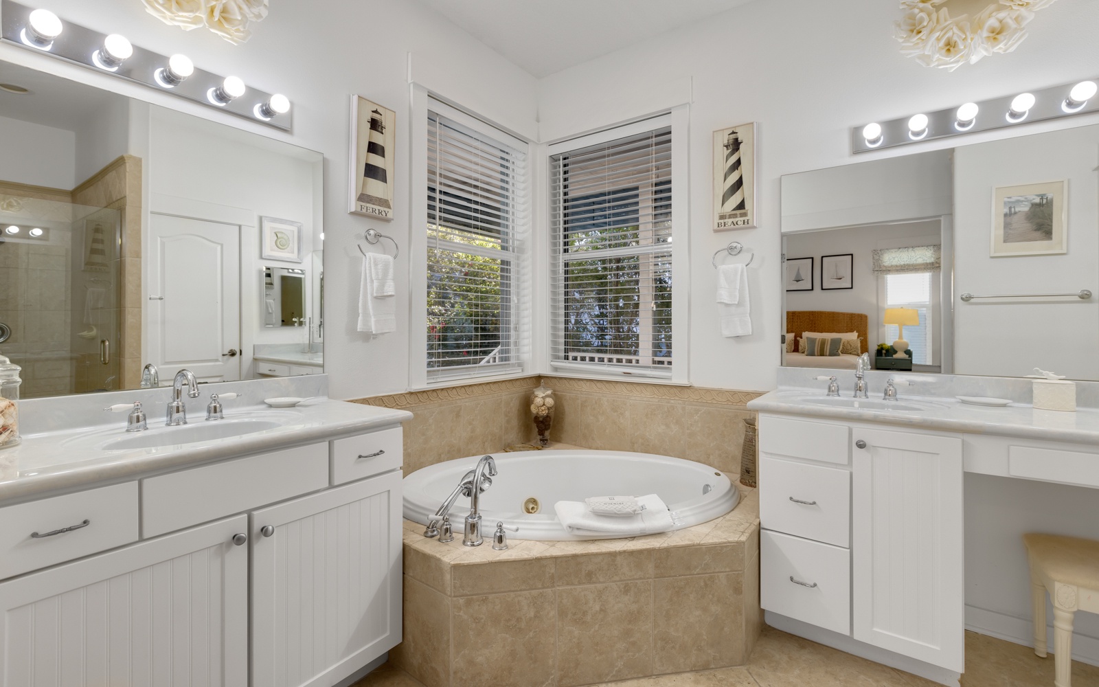 Unwind in your luxurious master bathroom featuring dual vanities, soaking tub, and elegant finishes for ultimate relaxation.