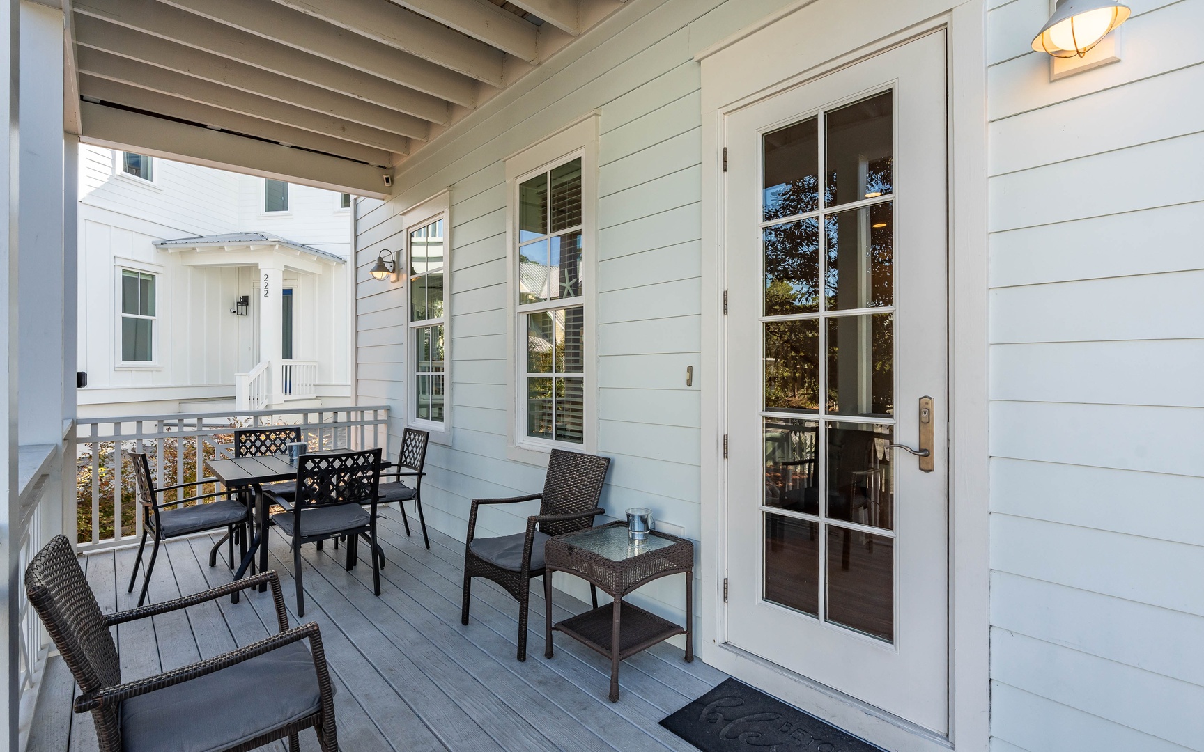 Step onto your private balcony where morning coffee tastes better in the fresh air, complete with cozy seating for two.