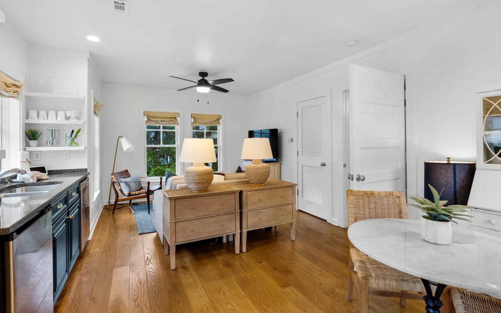 Unwind in your bright, open living space where natural textures and coastal charm create the perfect retreat atmosphere.