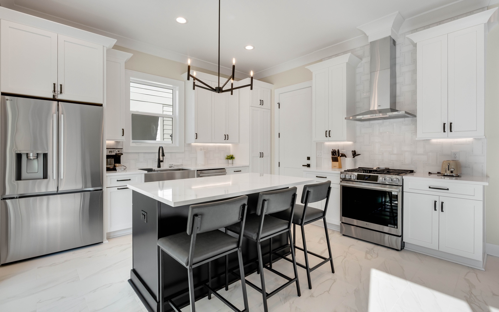 Your gourmet kitchen awaits with sleek white cabinets, granite counters, and stainless steel appliances for memorable home-cooked meals.