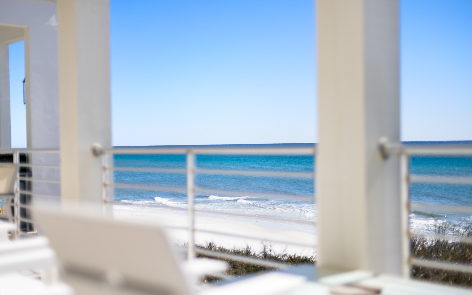 Wake up to endless gulf views from your private balcony, where gentle waves and pristine beaches create the perfect morning backdrop.
