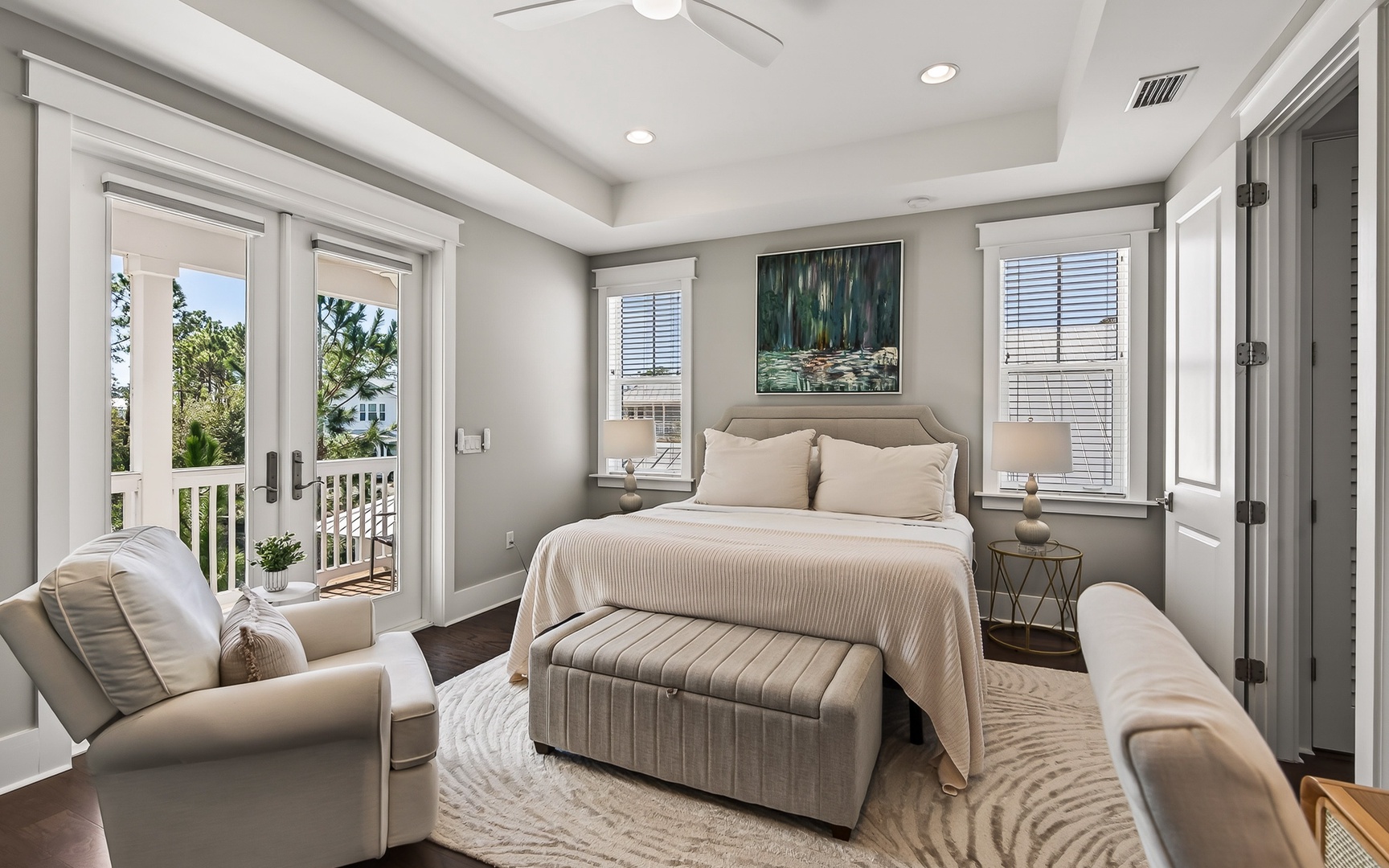 Your serene bedroom sanctuary features premium linens and private balcony access, creating the perfect retreat for peaceful mornings and restful nights.