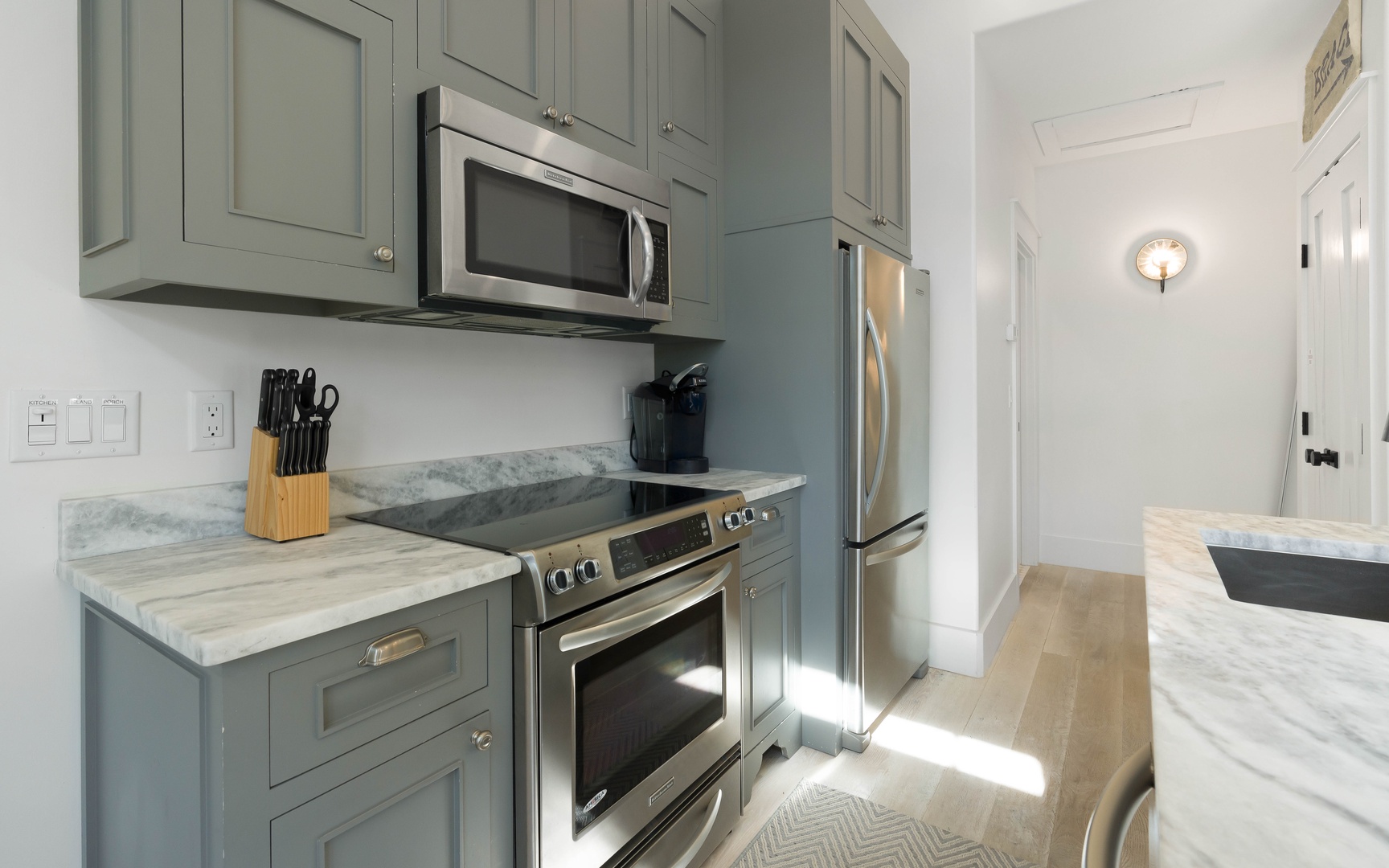 Your fully equipped kitchen features sleek stainless steel appliances and elegant marble countertops for culinary adventures during your stay.