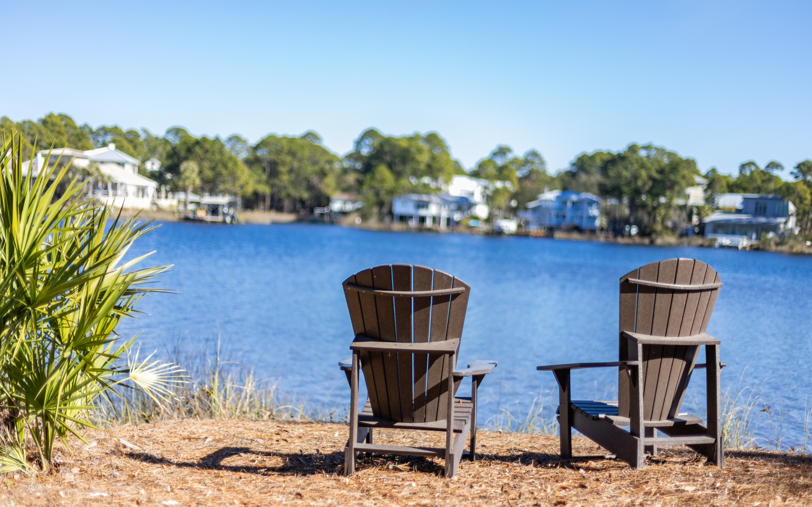 Settle into these waterfront chairs and let the tranquil lake views wash away your worries on this perfect day.