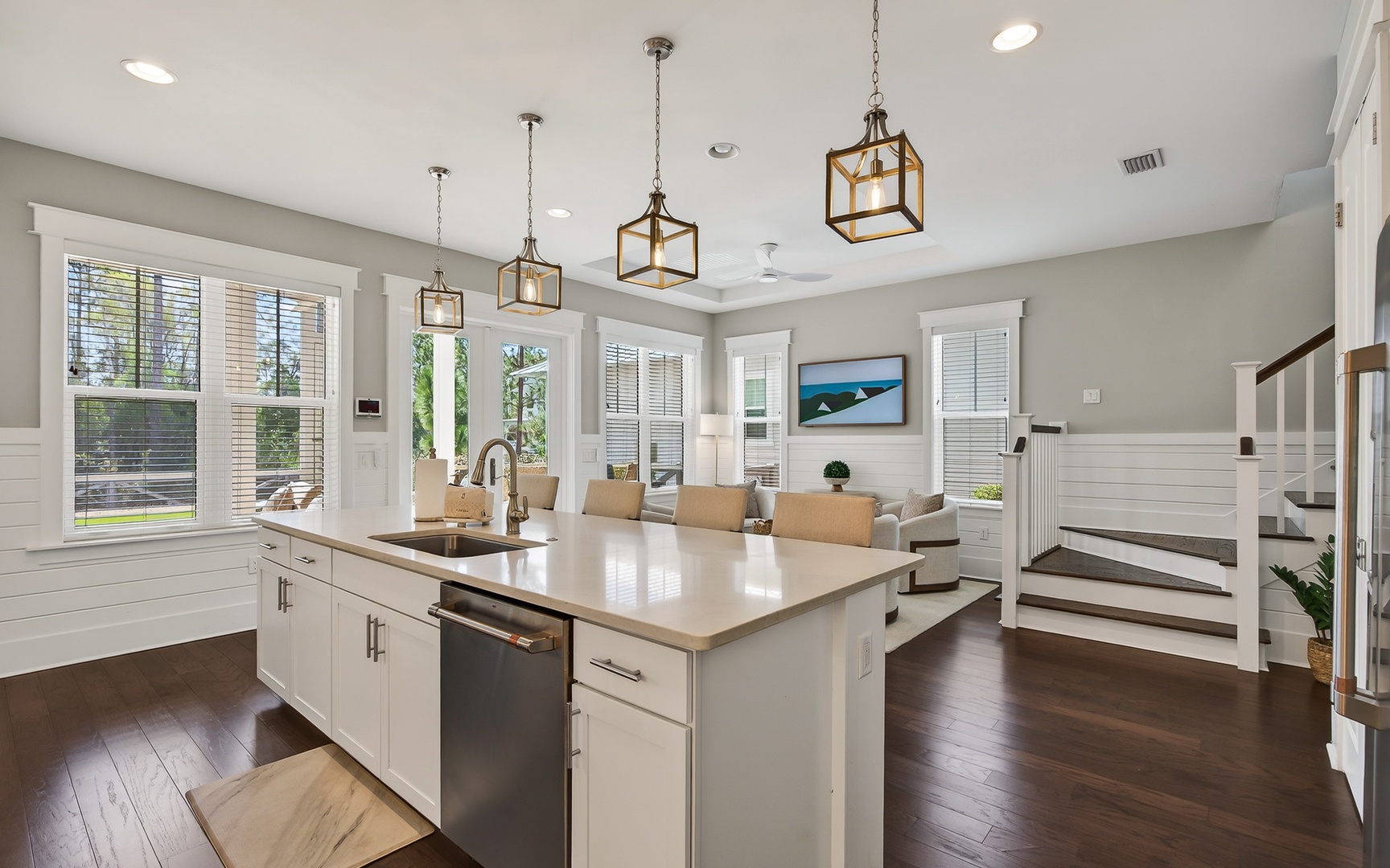 Your open-concept haven features a stunning kitchen island perfect for morning coffee and evening gatherings with loved ones.