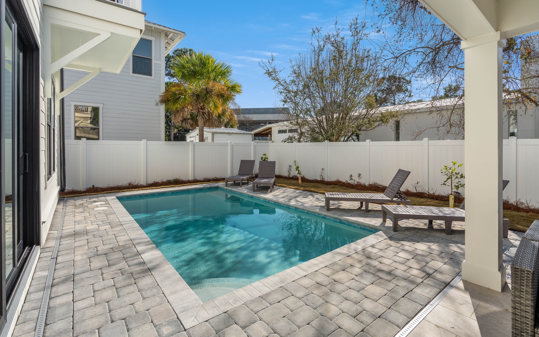 Dive into your private oasis! This sparkling pool awaits your morning swim, surrounded by loungers for afternoon relaxation.