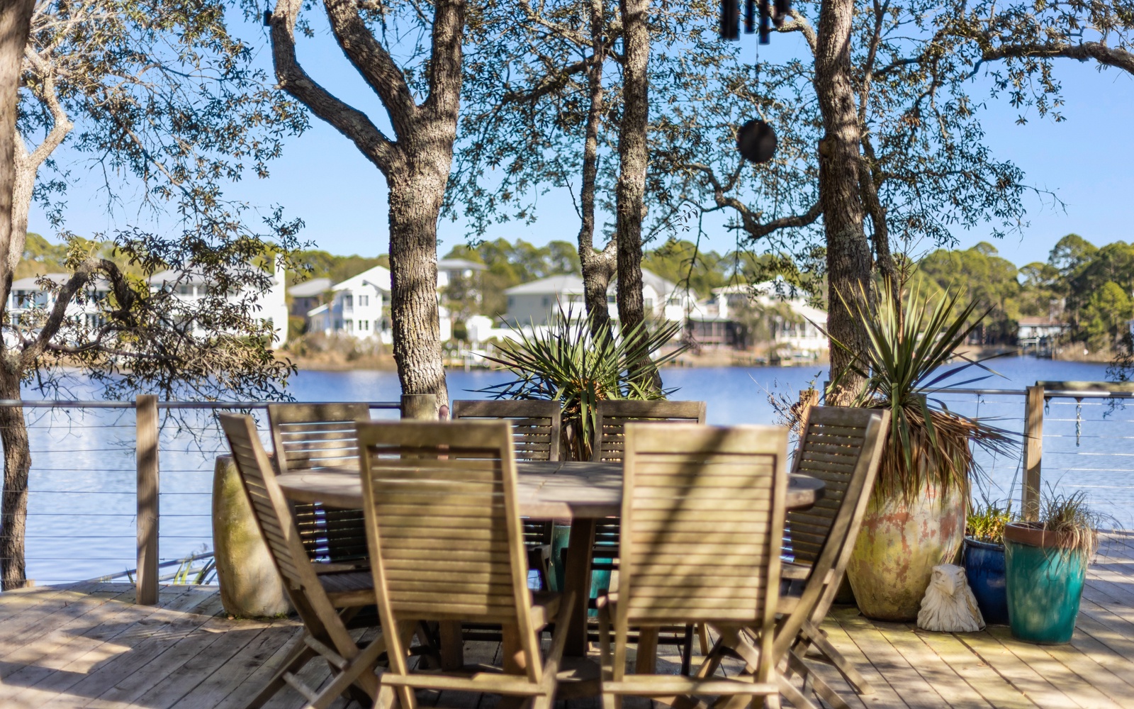 Savor morning coffee at your private waterfront deck, where gentle lake breezes and dappled sunlight create the perfect backdrop for relaxation.